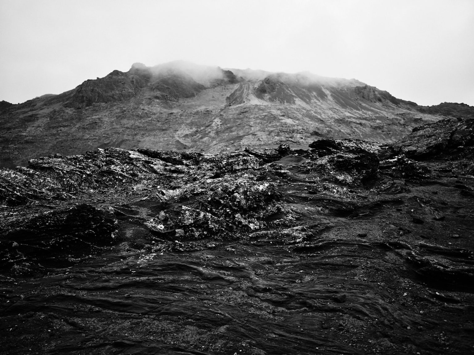 A black lava crater field on Reykjanes in black and white, Iceland