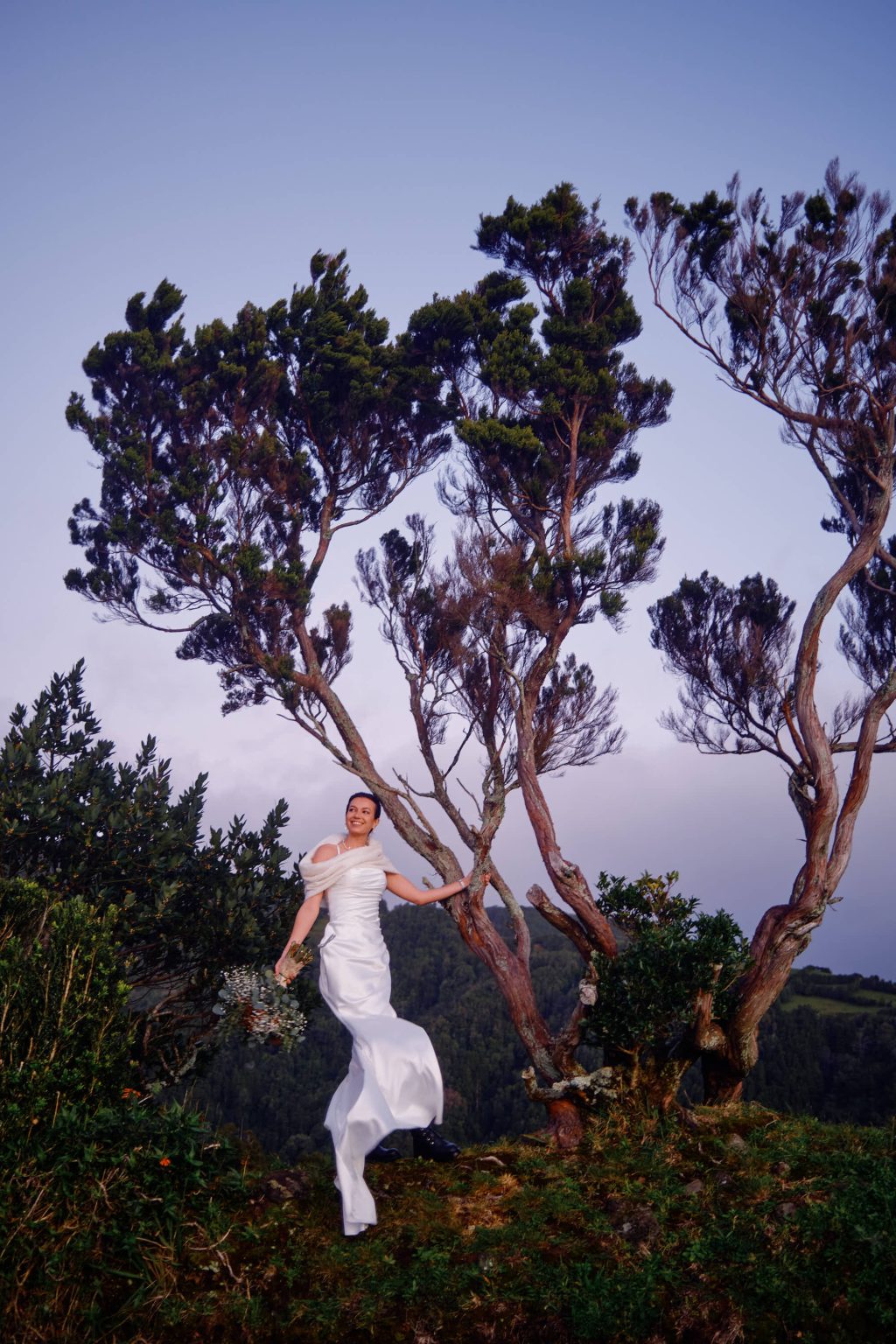 The bride at a São Miguel viewpoint at sunset