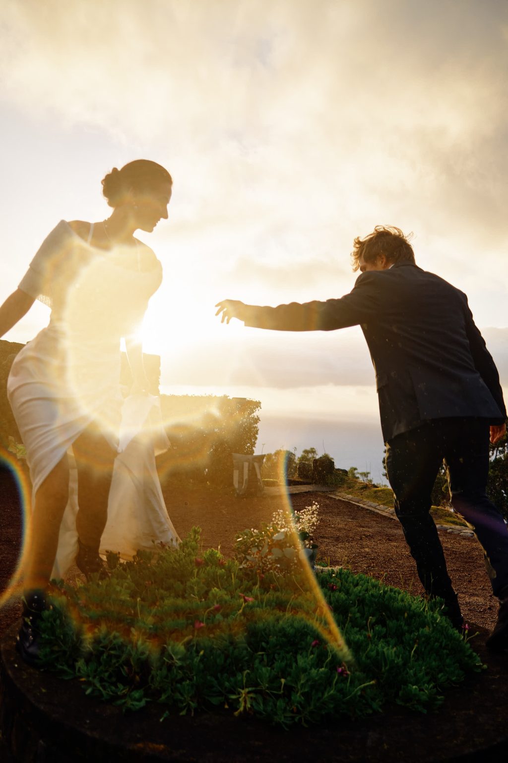 The couple silhouetted at sunset on São Miguel