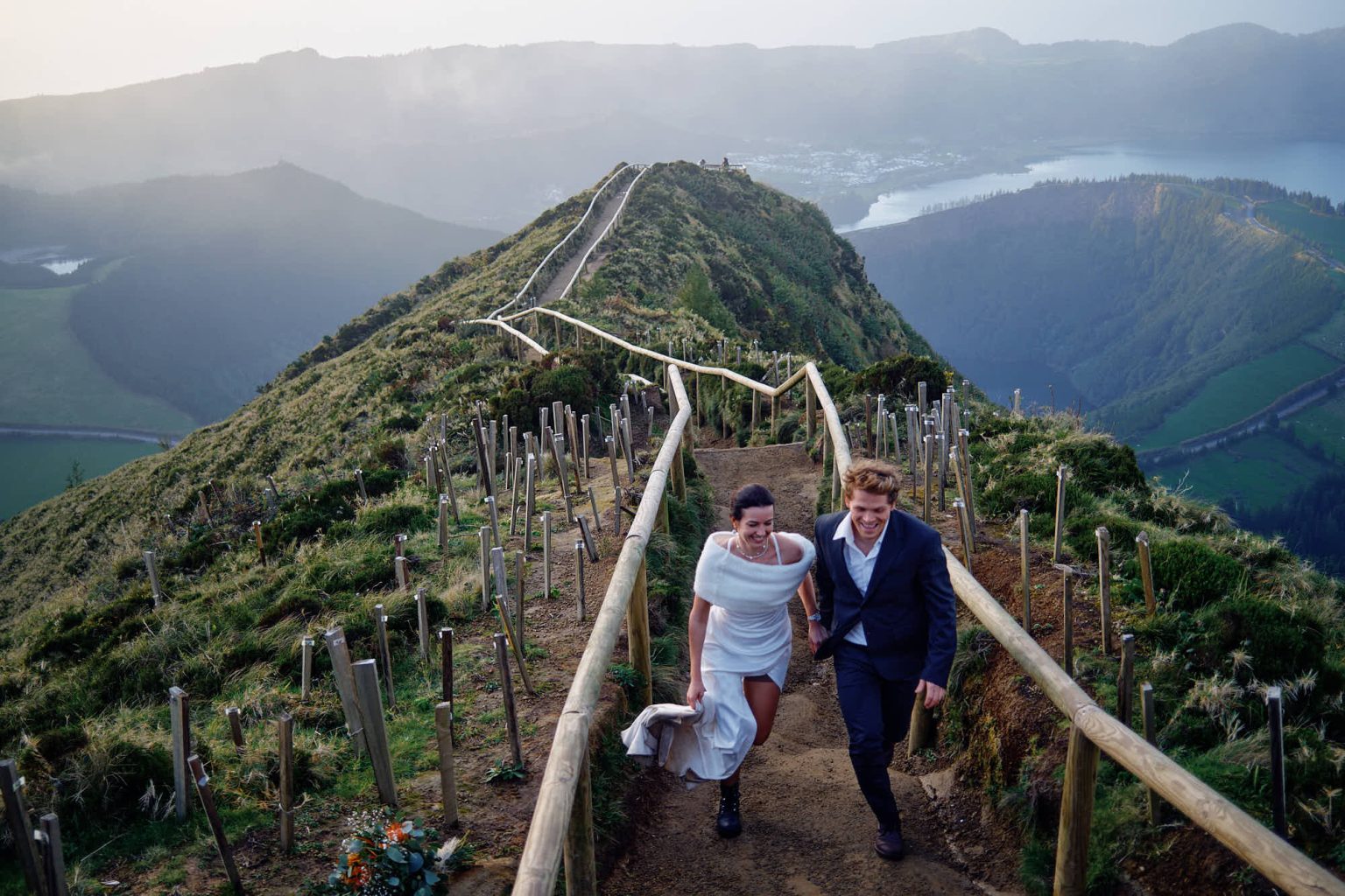 Bride and groom on a crater ridge path, São Miguel