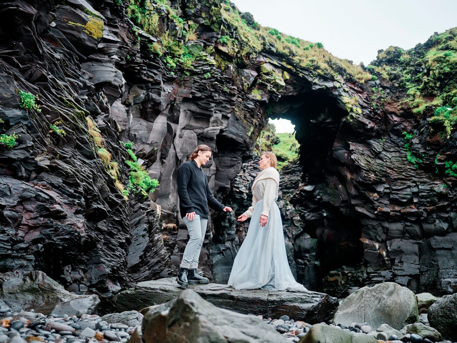 The couple among the mossy lava, Snæfellsnes, Iceland