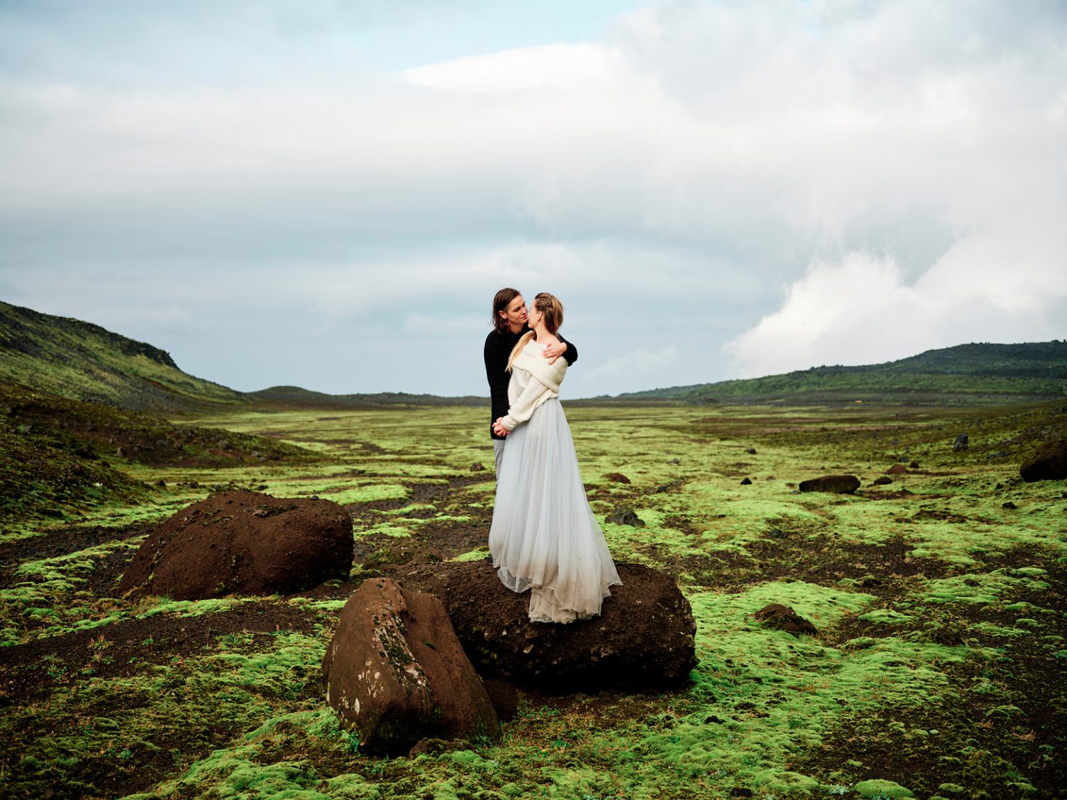 Klara Jenný and Siddy on the mossy plain under a big sky, Snæfellsnes