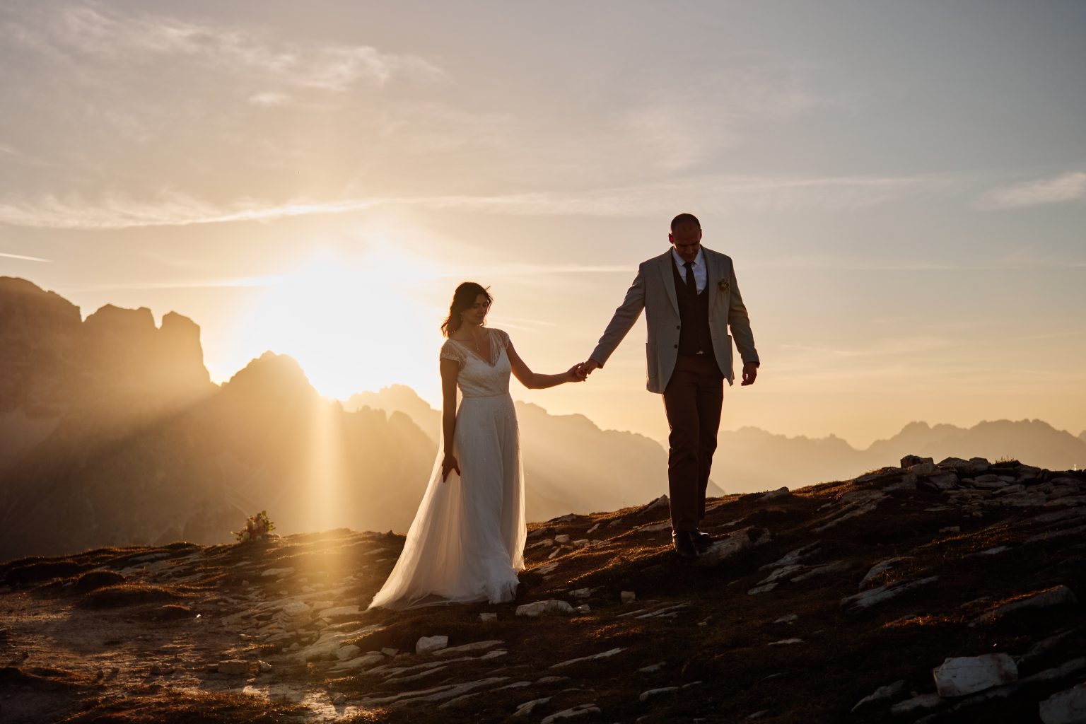 Lottie and Jack walking into the sun, Tre Cime di Lavaredo