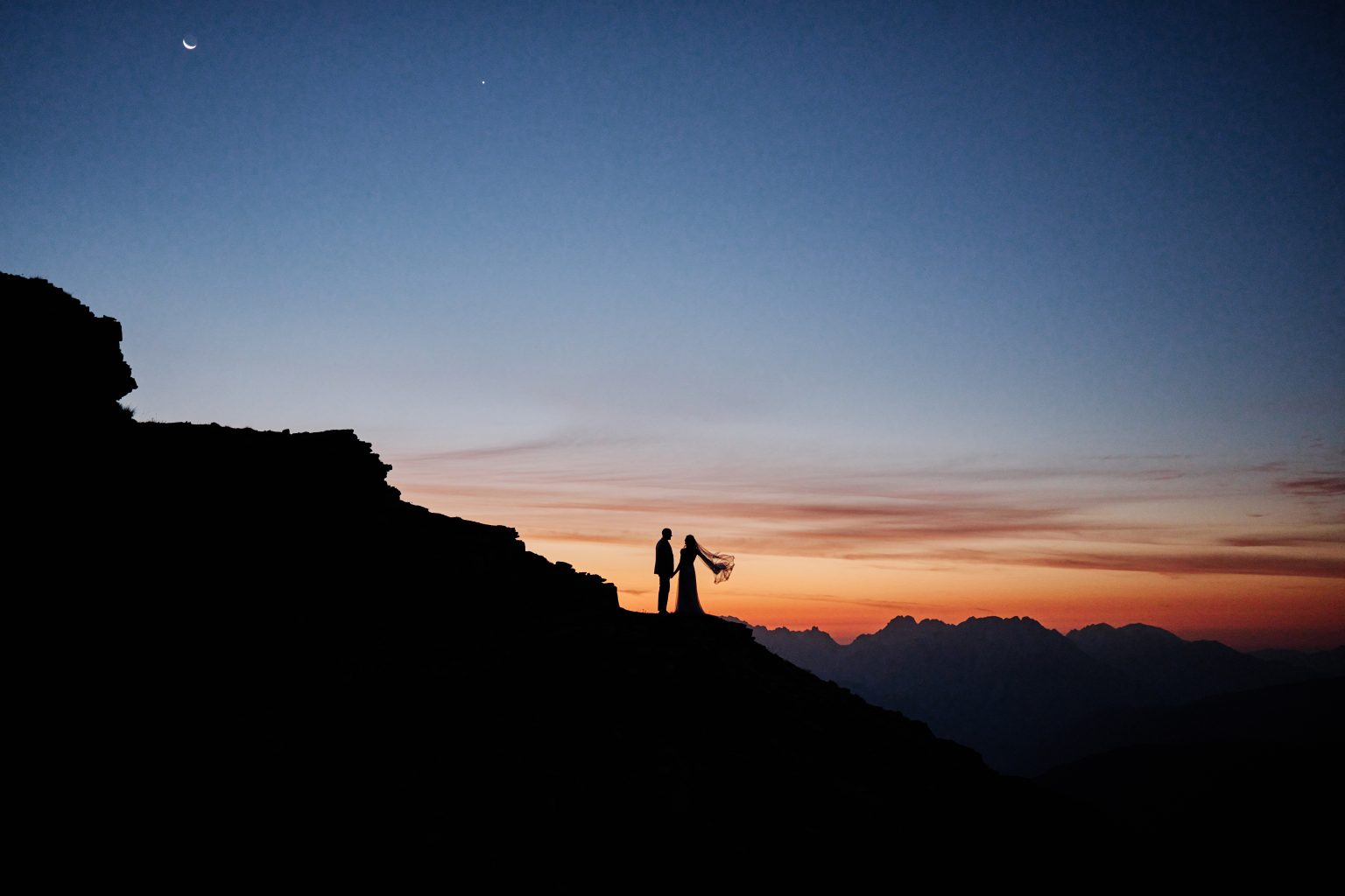 Lottie and Jack at dawn on the ridge, Tre Cime elopement