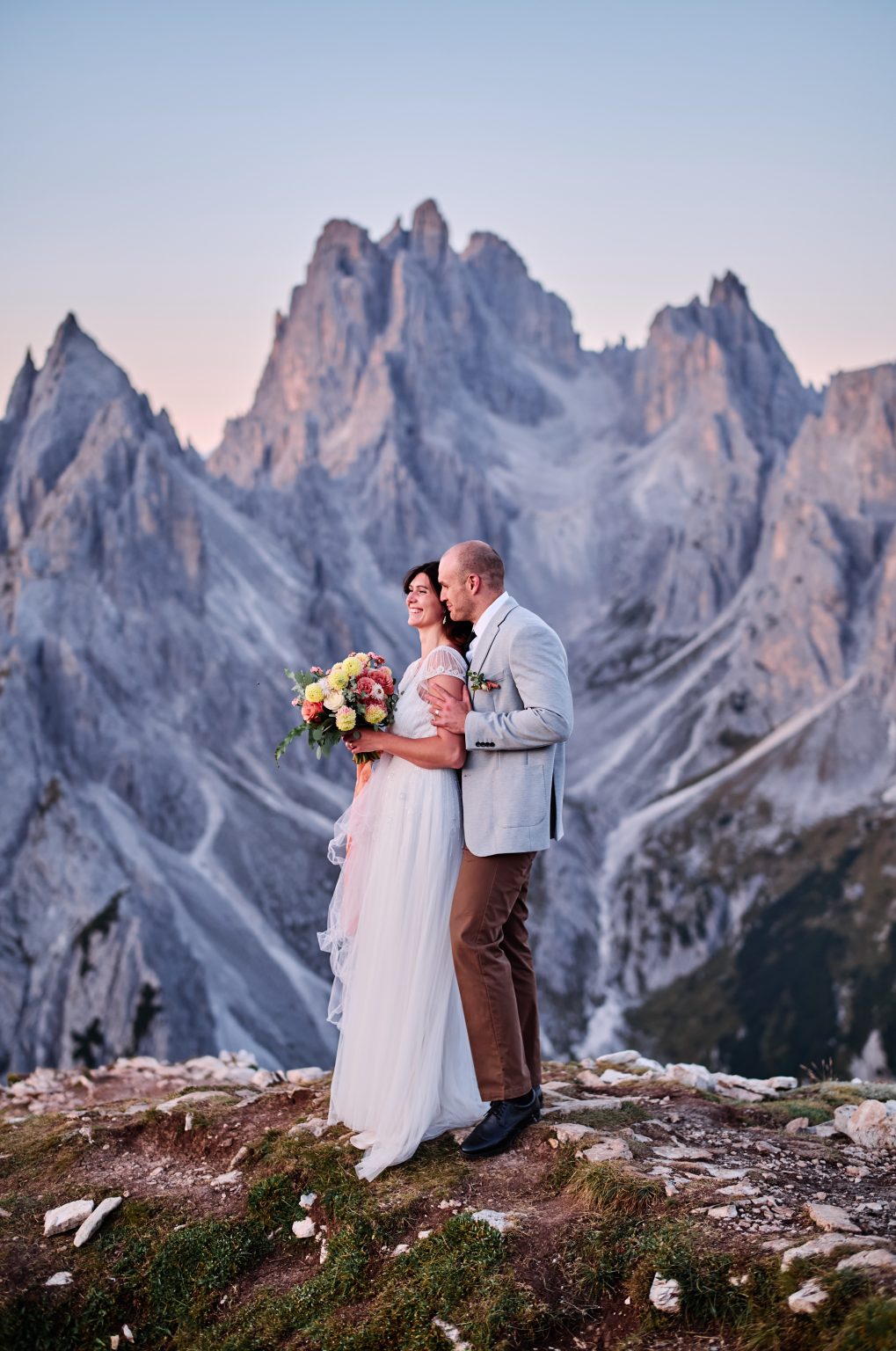 Lottie with her bouquet below the peaks, Tre Cime di Lavaredo