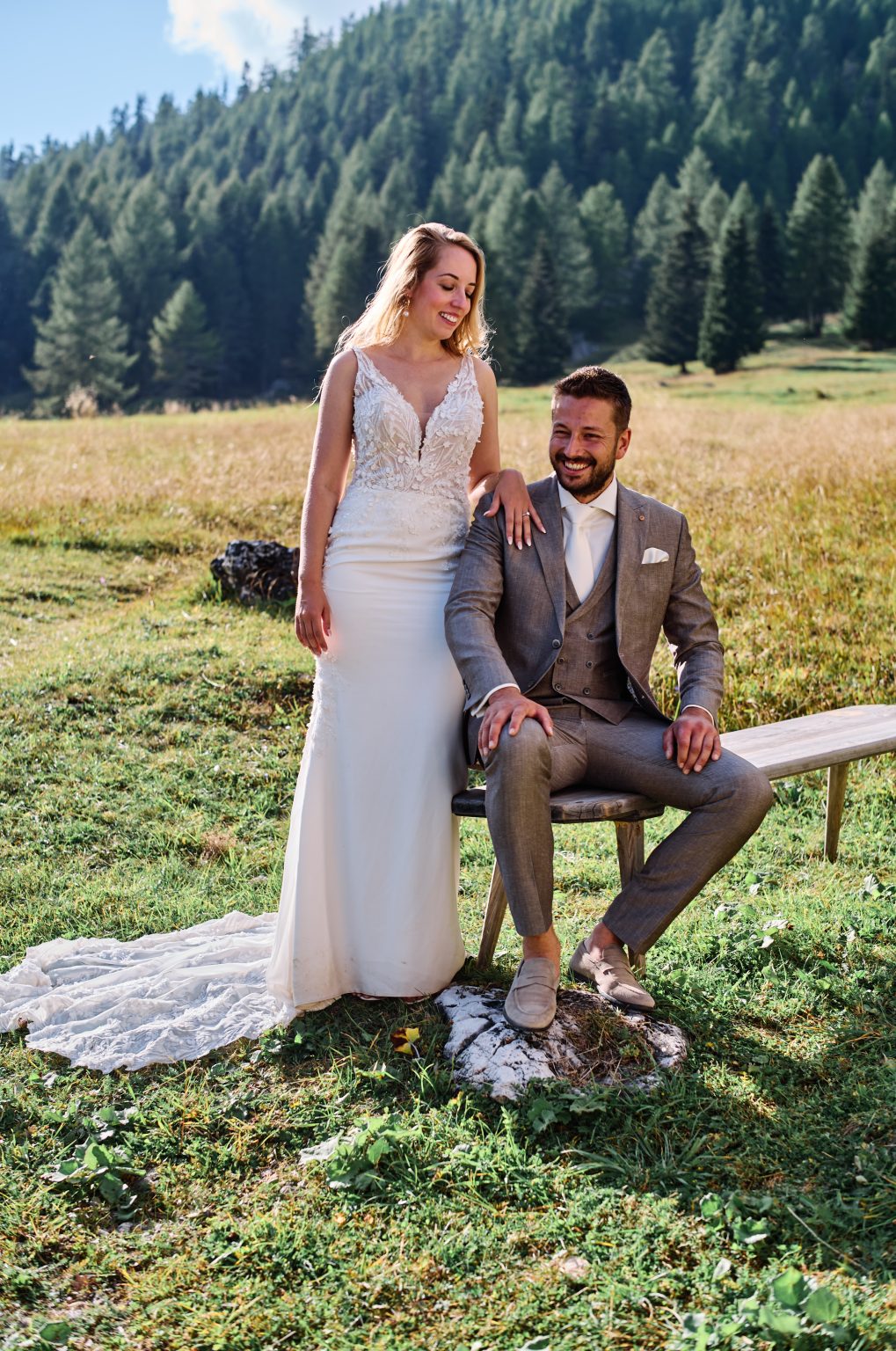 The couple resting in the meadow, Dolomites wedding photographer