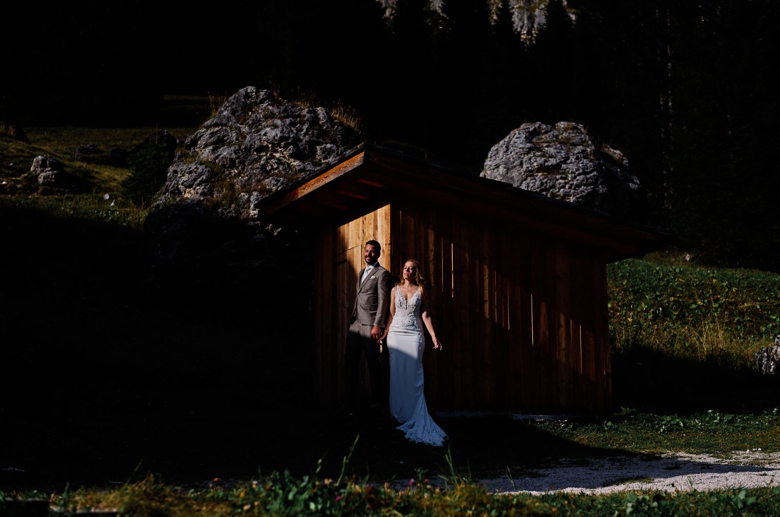 Charlotte in a mountain hut doorway, Dolomites, black and white