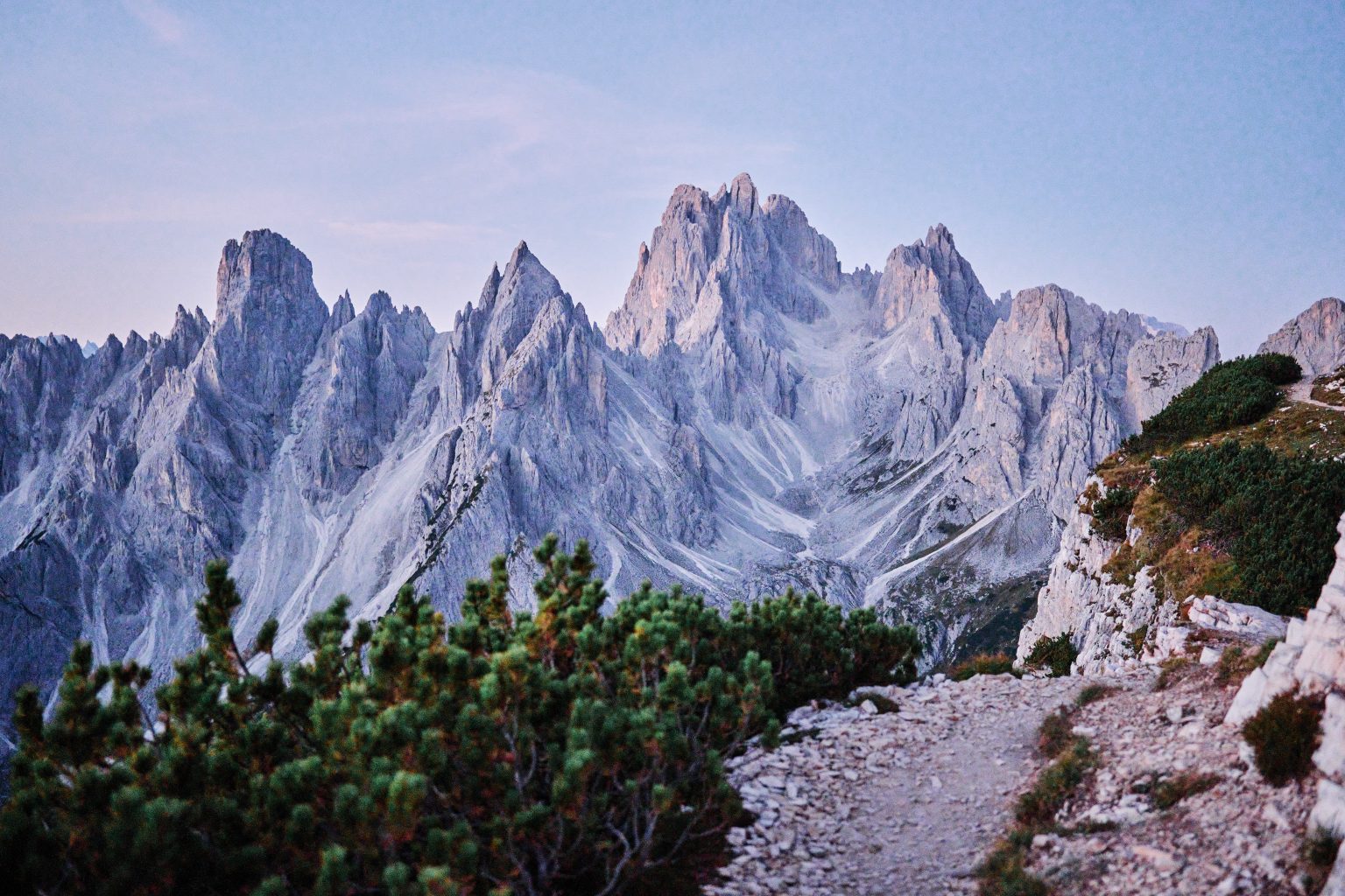 Bride below the peaks of Tre Cime di Lavaredo, Dolomites wedding