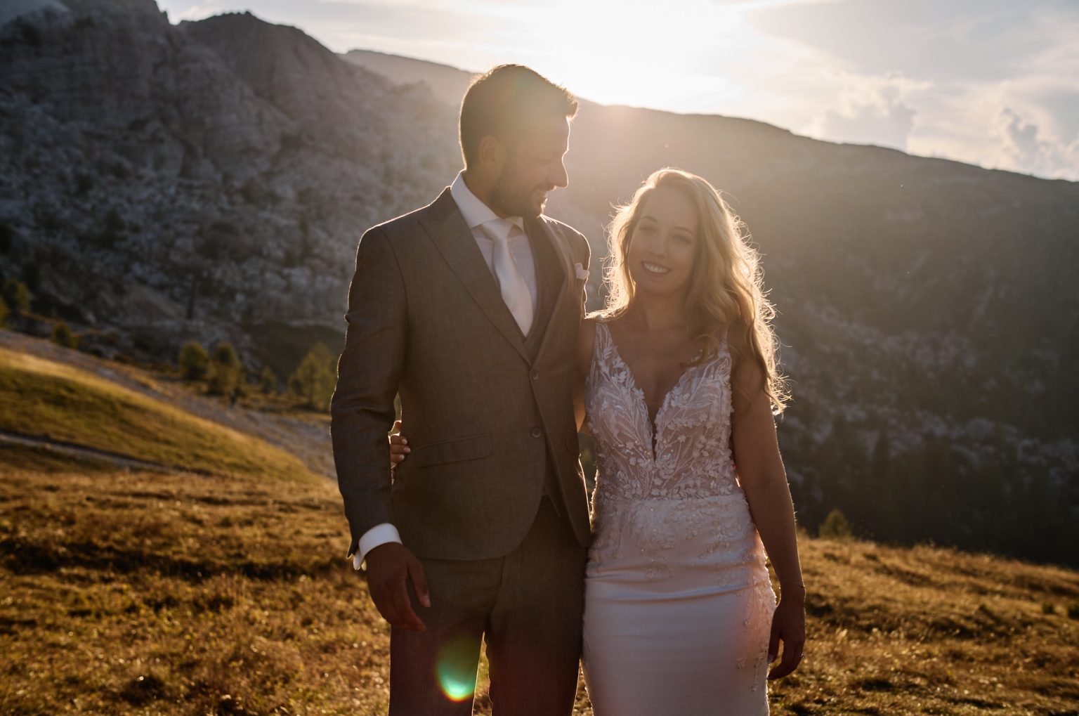 Charlotte and Collin in golden evening light, Passo Giau
