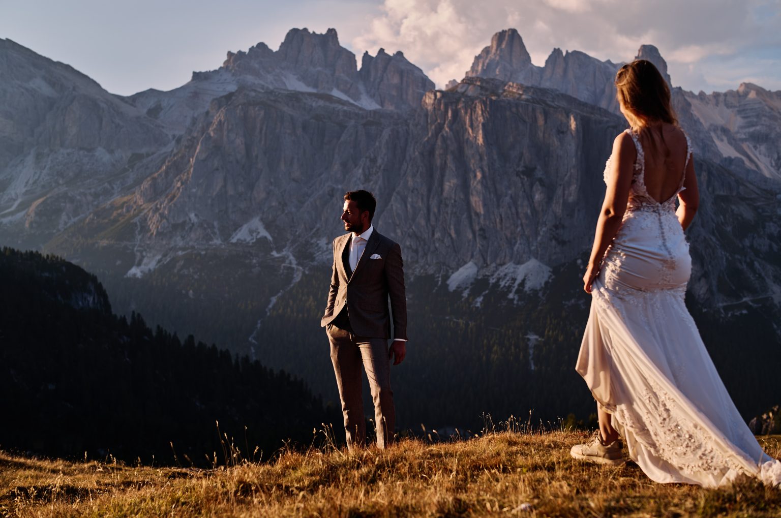 Bride and groom in the last light, Passo Giau