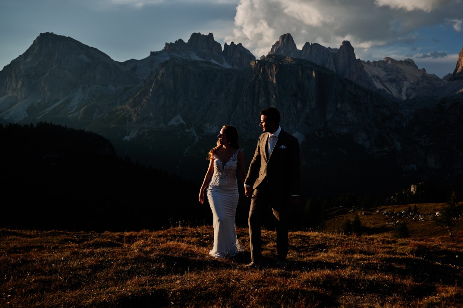 Charlotte and Collin on the ridge at dusk, Dolomites