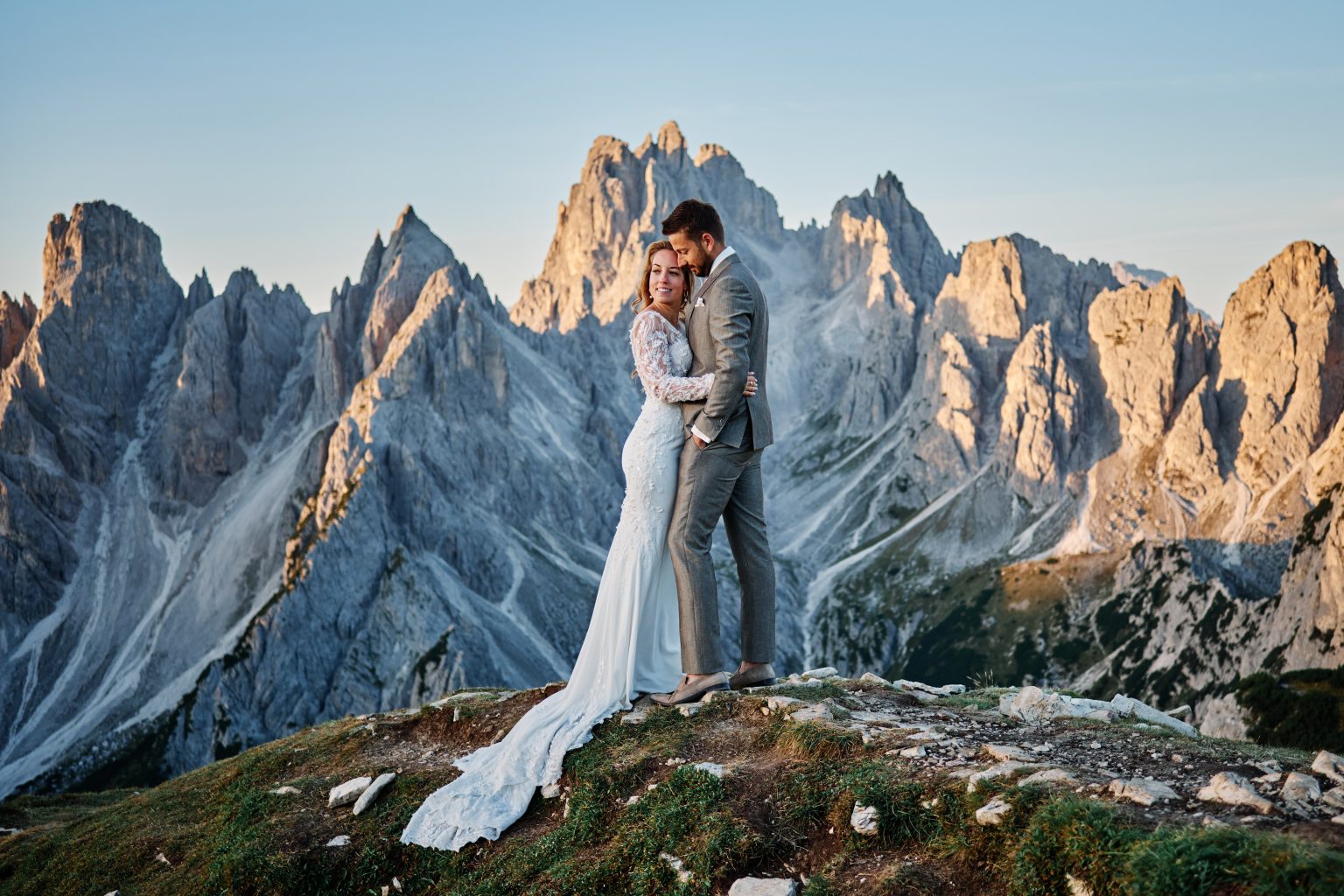 Charlotte and Collin at sunrise below the Cadini spires, Tre Cime di Lavaredo wedding photographer