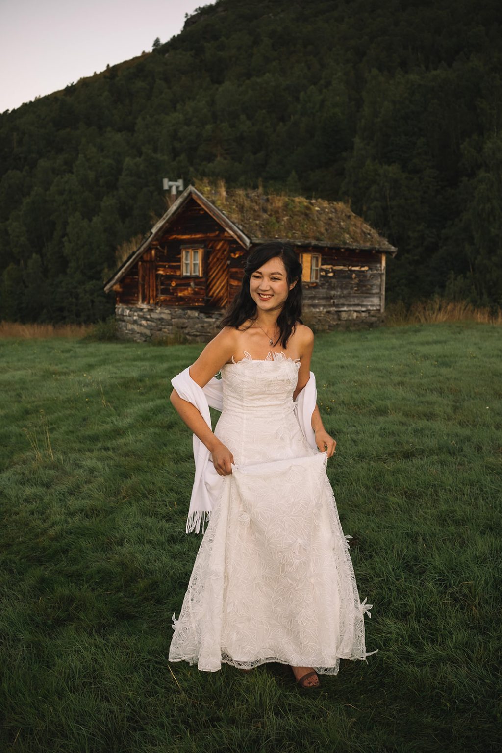 The couple close together in the dawn light, Juvet Landscape Hotel wedding