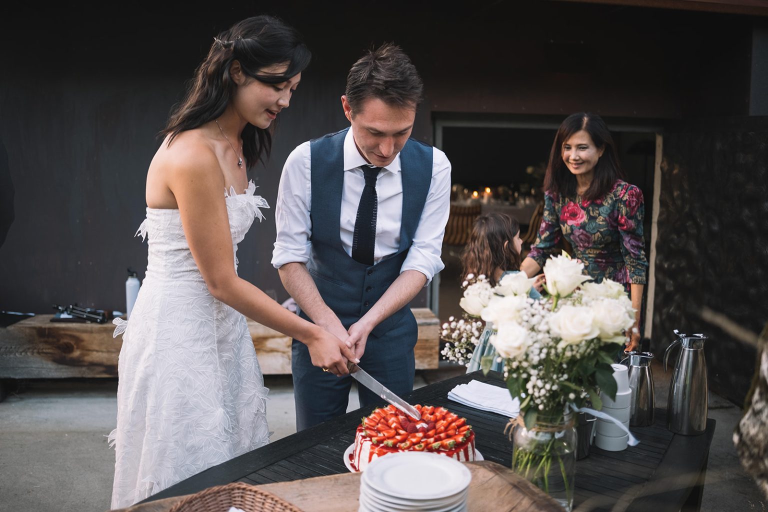 Cutting the cake at Juvet Landscape Hotel, Norway wedding