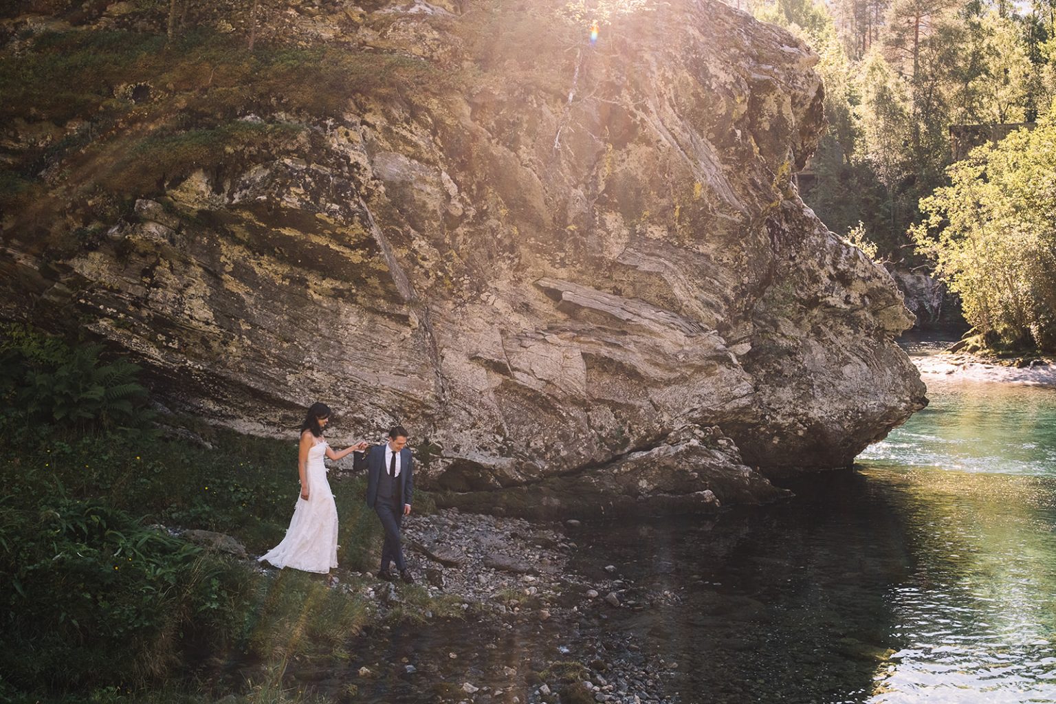 Ida and James by the river gorge at the end of the day, Juvet