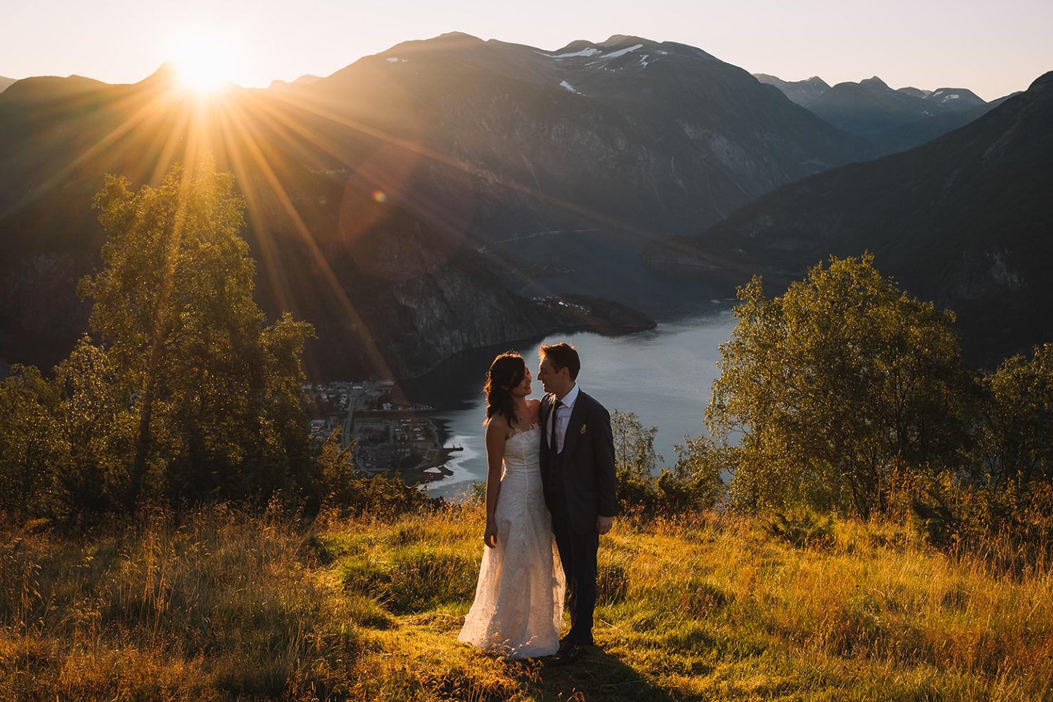 An embrace as the sun crests the mountains, a Juvet wedding photographer