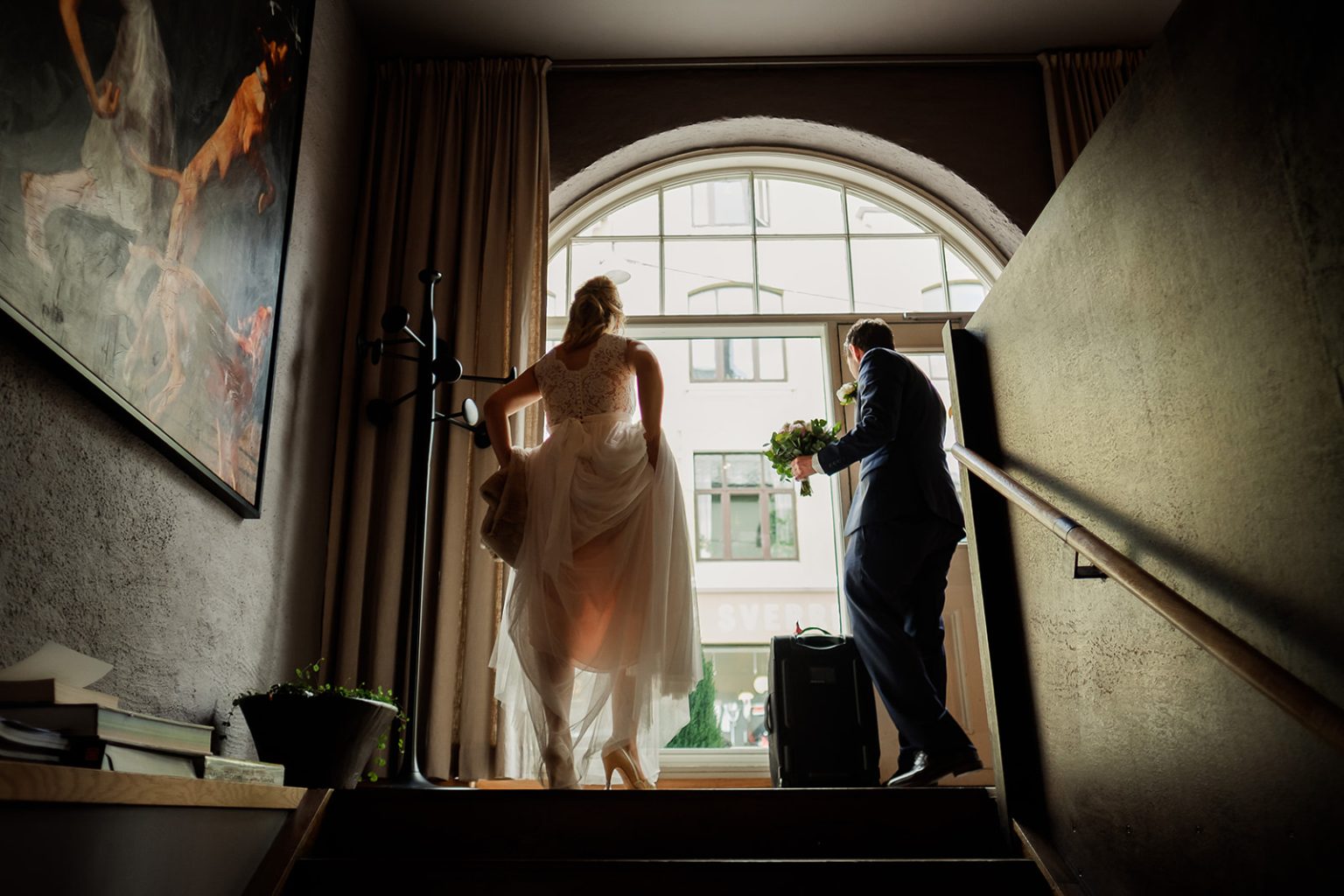 Bride getting ready in window light, Ålesund