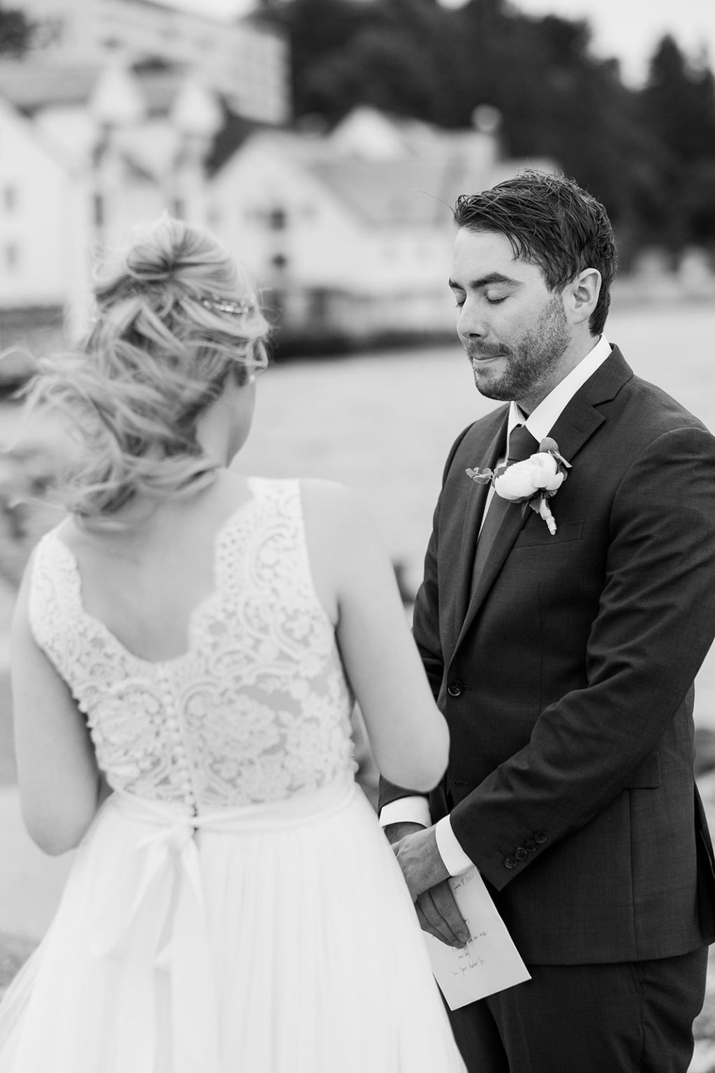 Groom kissing the bride's forehead, Ålesund elopement