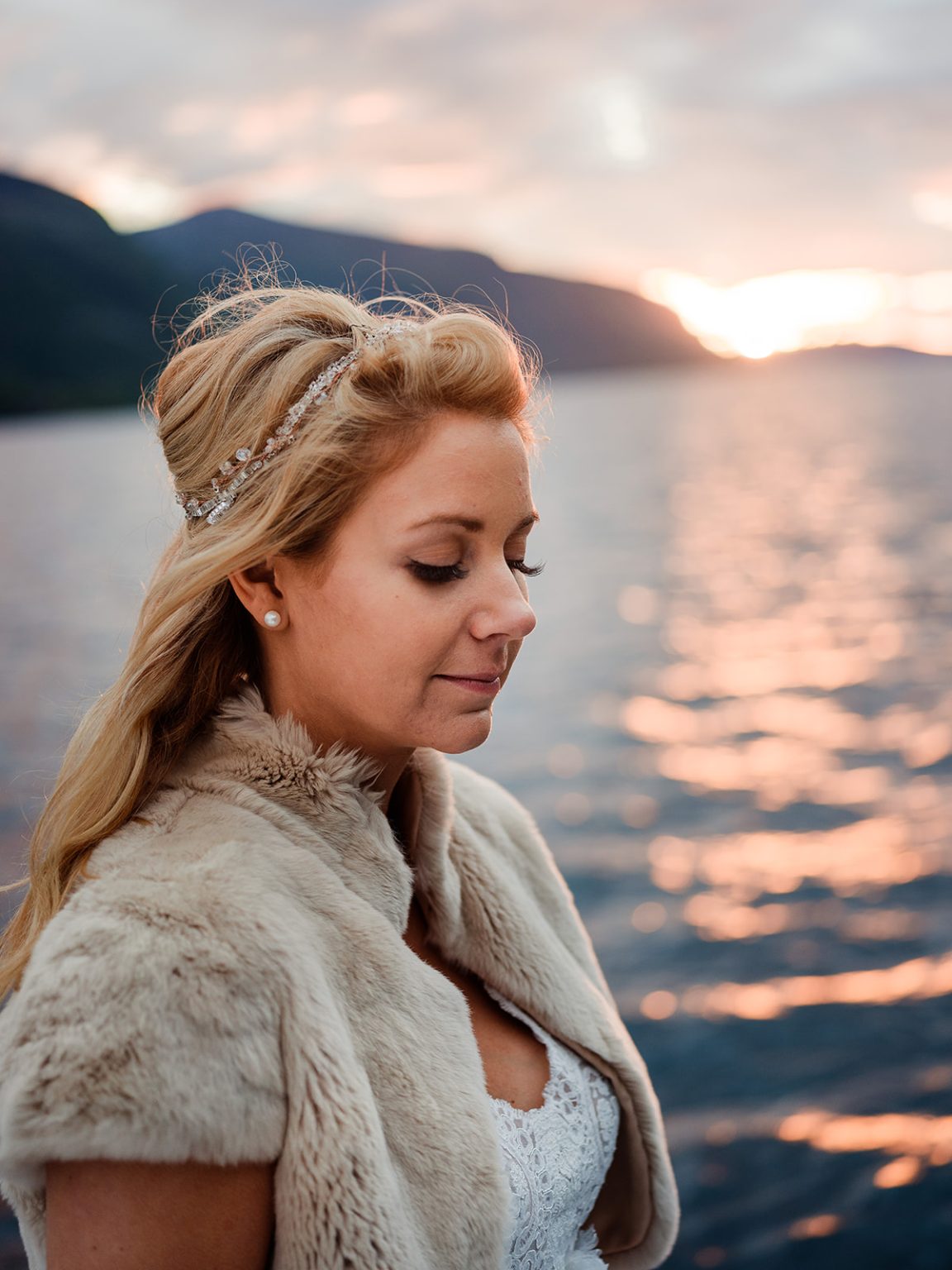 Bride at golden hour on the fjord