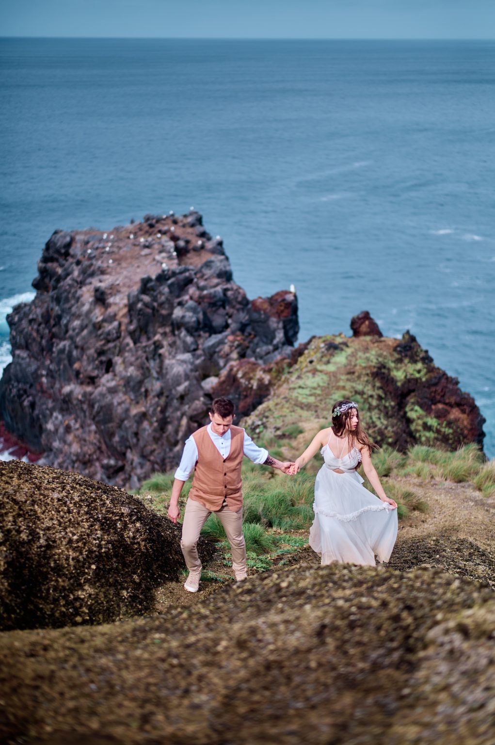 Silvia and Florin on volcanic sea rocks, São Miguel