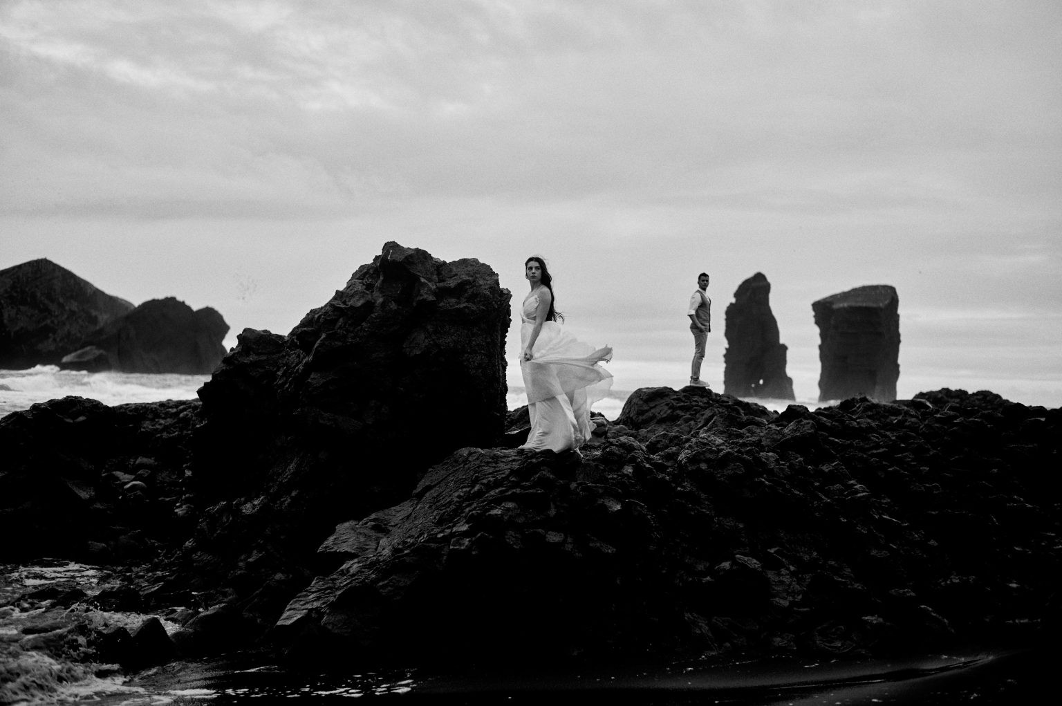 Silvia and Florin by the sea stacks at Mosteiros