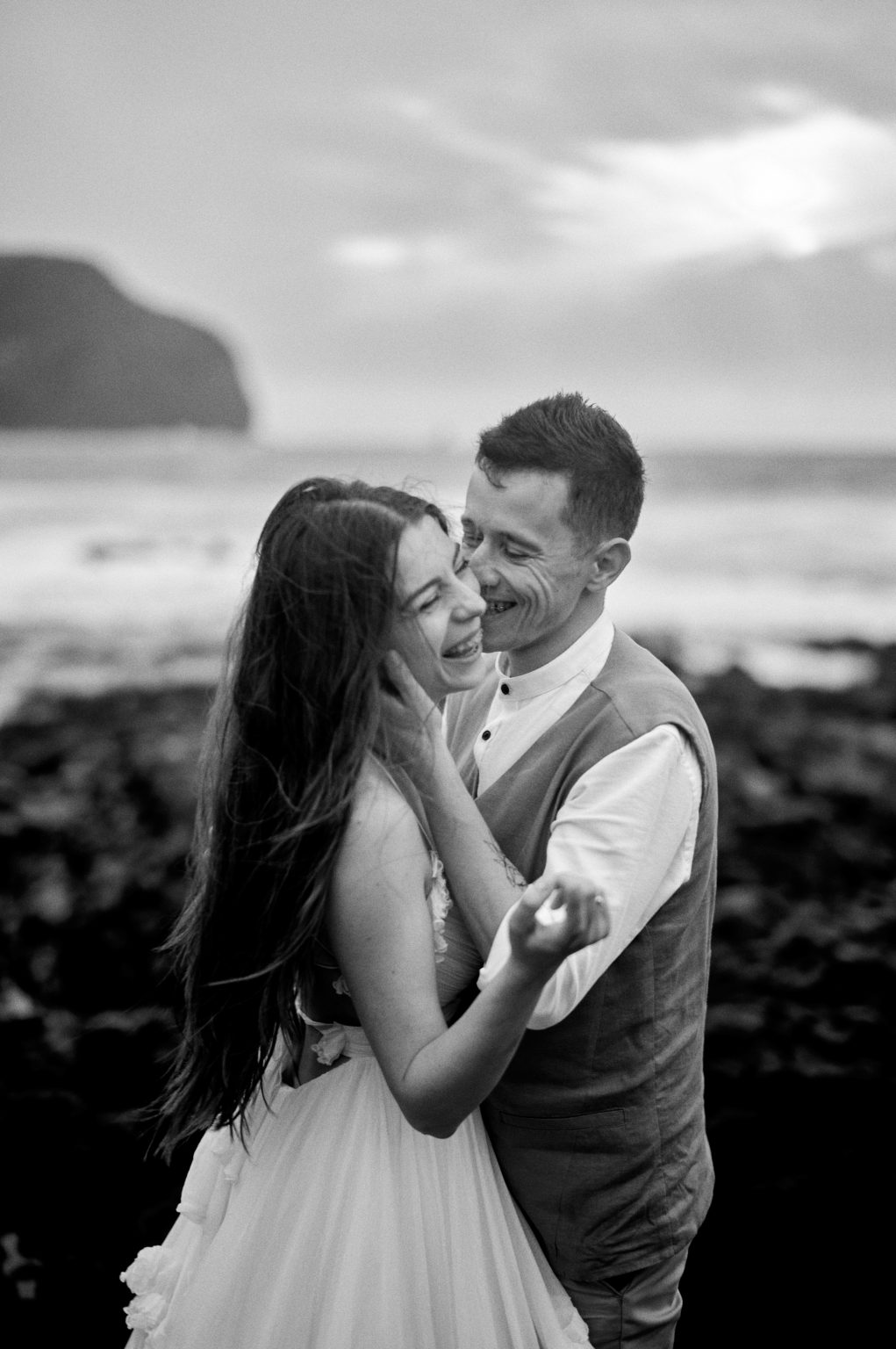 The couple close on the beach at Mosteiros at dusk