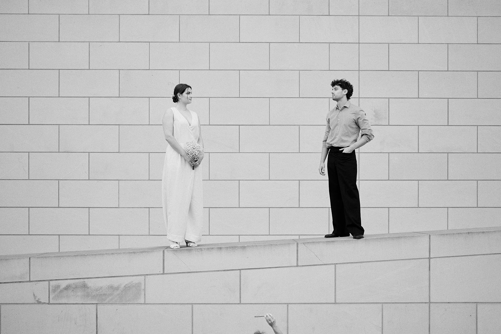 Editorial black and white engagement photo on the steps in Berlin - Nordica Photography
