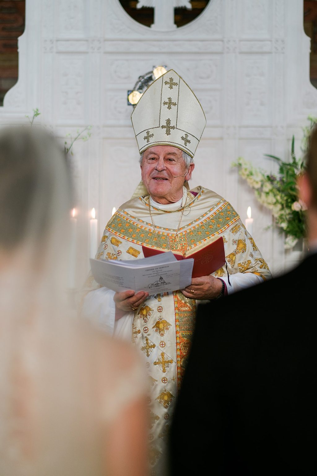 The bishop during the wedding ceremony