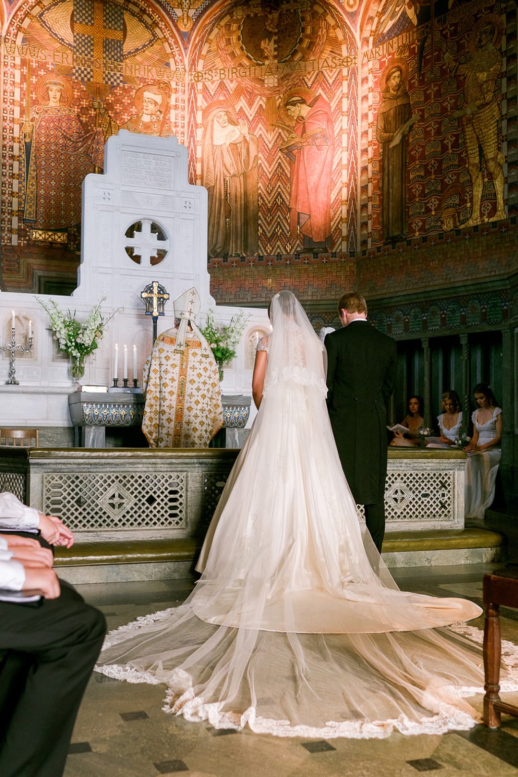 The train of the wedding dress at the altar