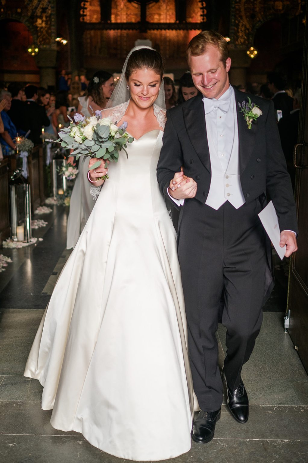Bride and groom leaving the church