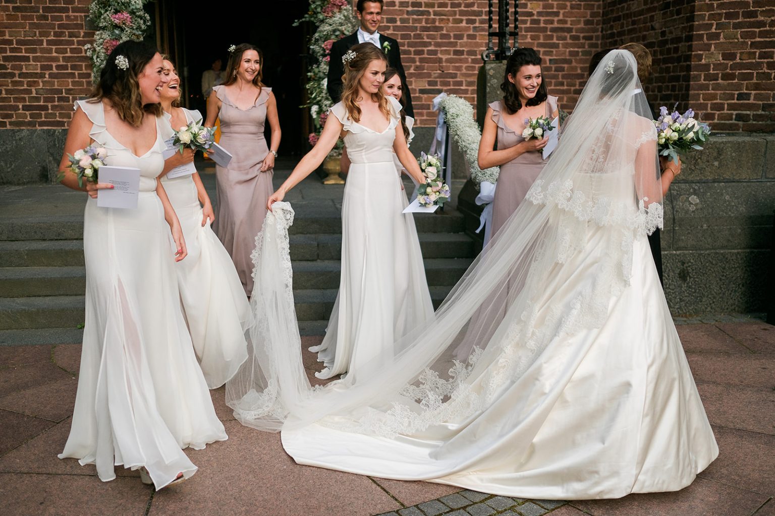 Bride and bridesmaids outside the church