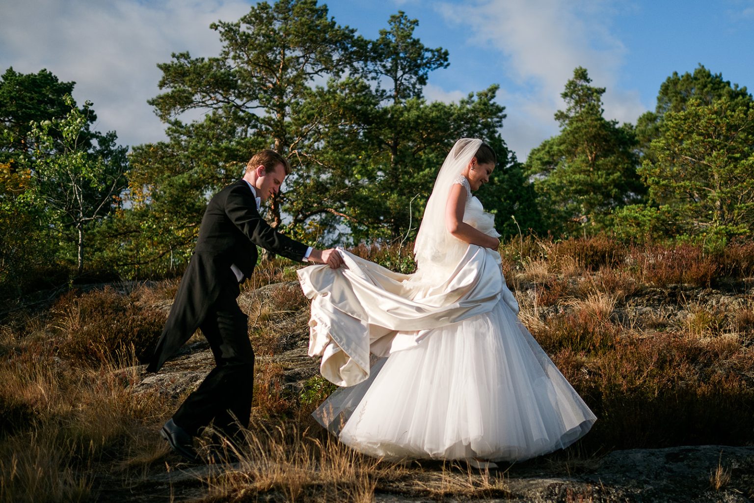 Bride and groom on the rocks in the archipelago