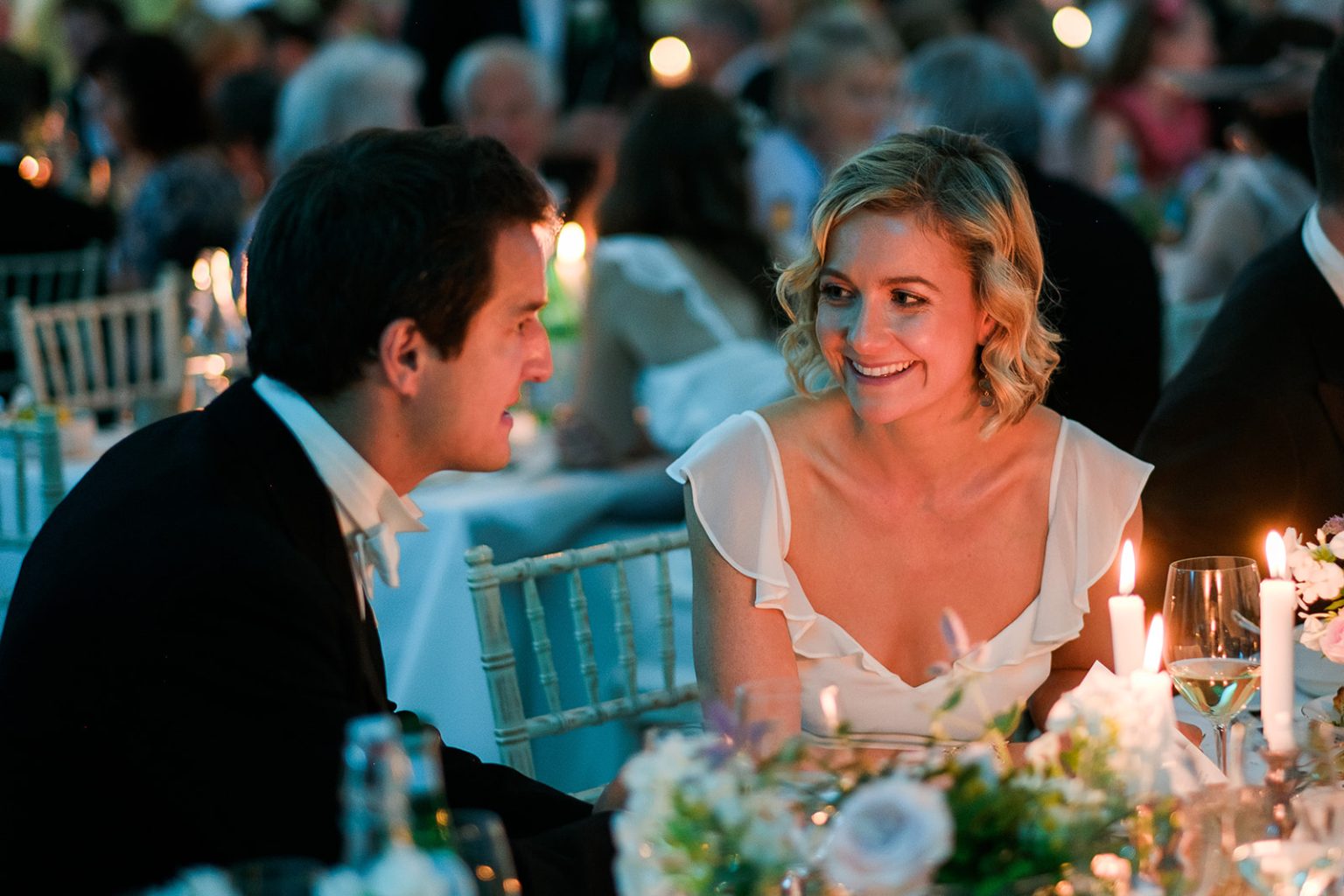 Bride and groom at the candlelit dinner