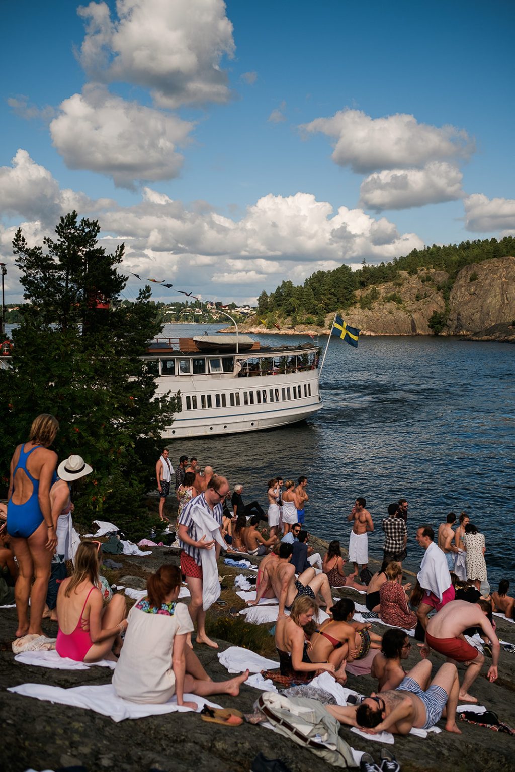 The archipelago steamer anchored off the rocks