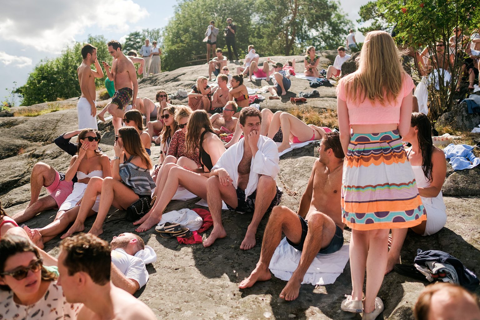 Guests swimming off the rocks in the Stockholm archipelago