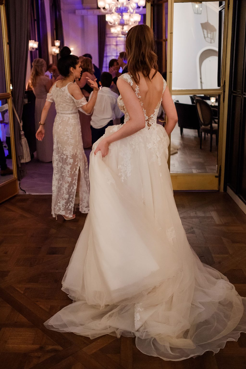 Bride in the hotel corridor after the wedding