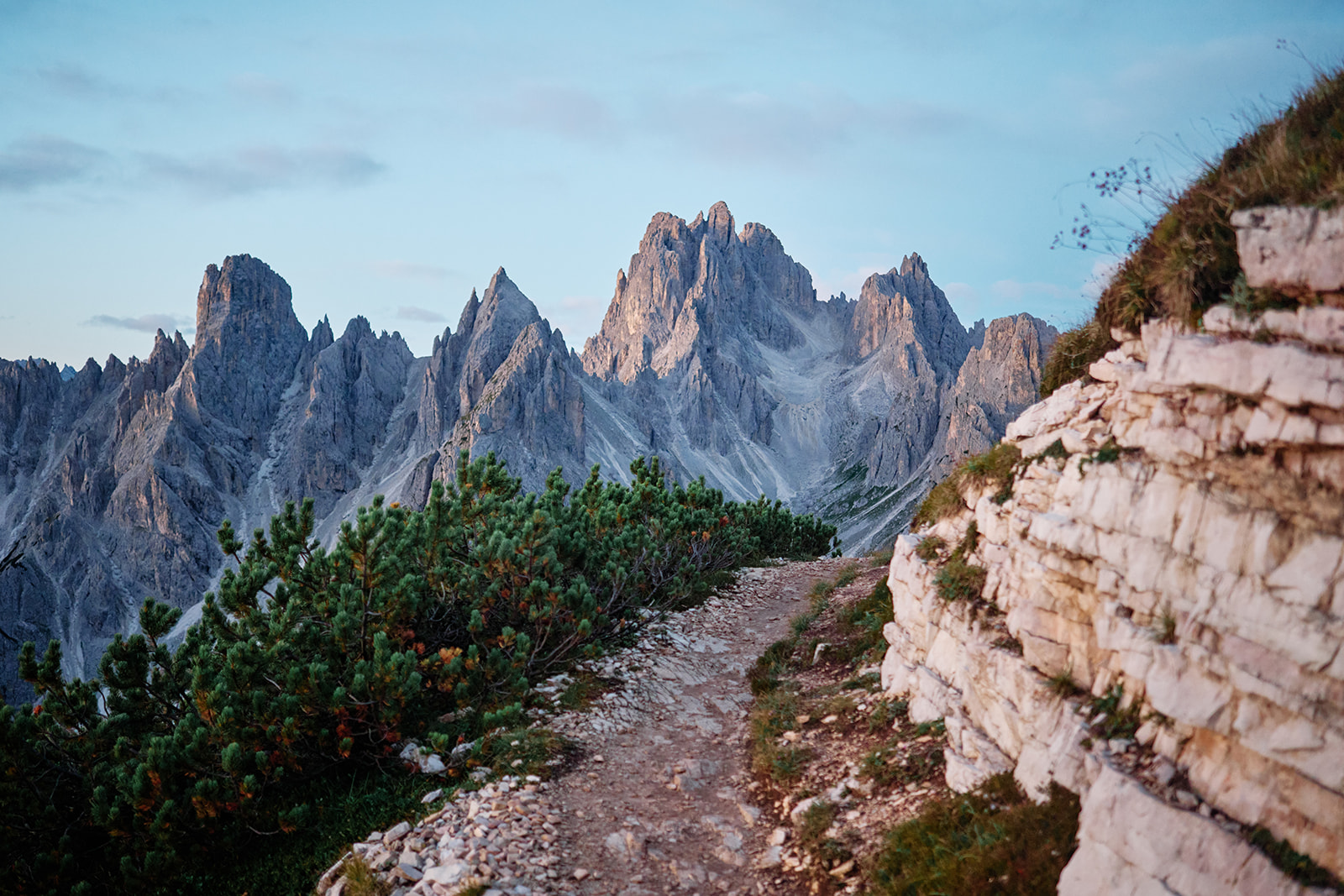 Couple at the north faces of Tre Cime, Dolomites