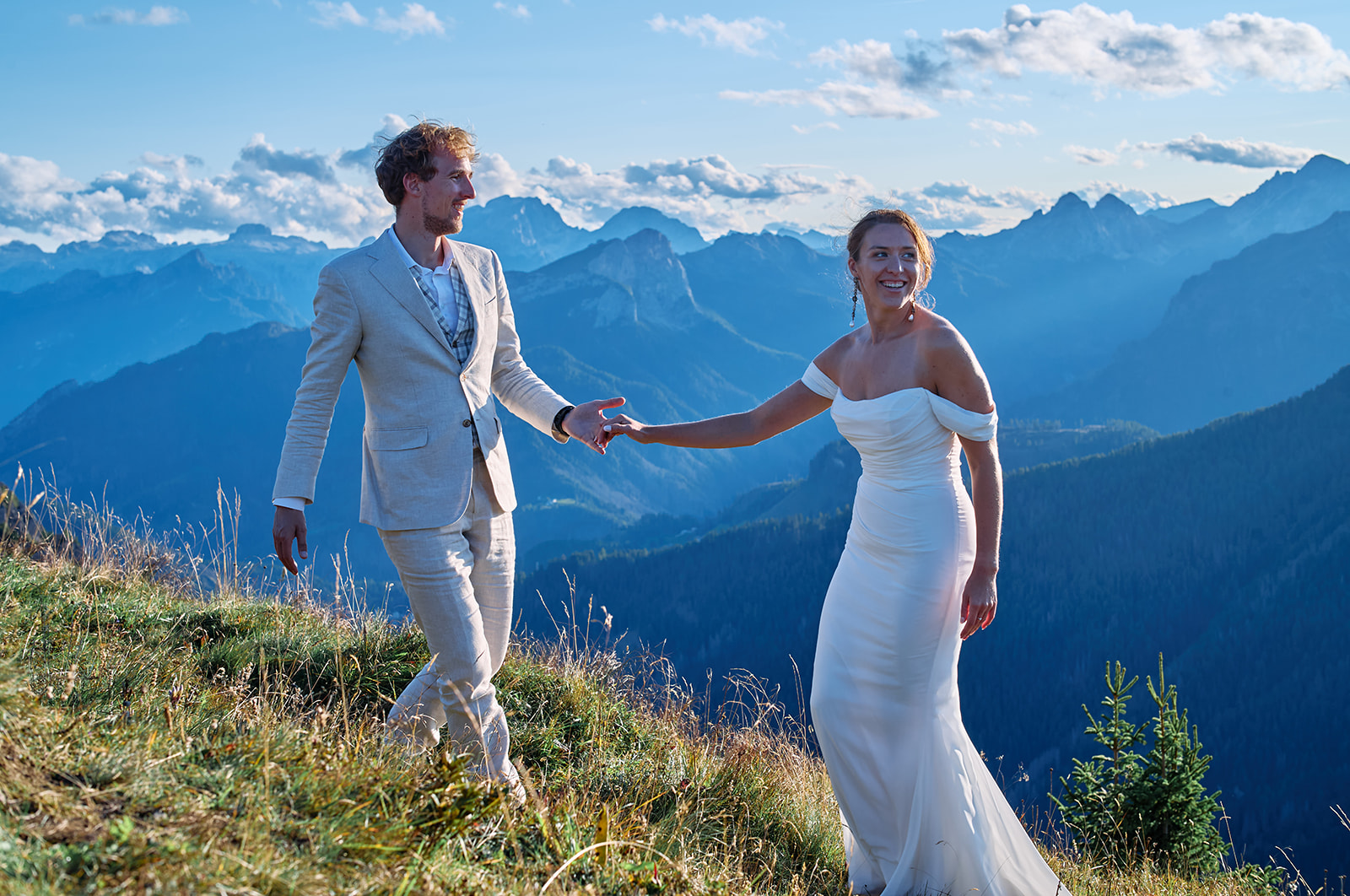 Couple at Passo Giau as the sun goes down, Dolomites