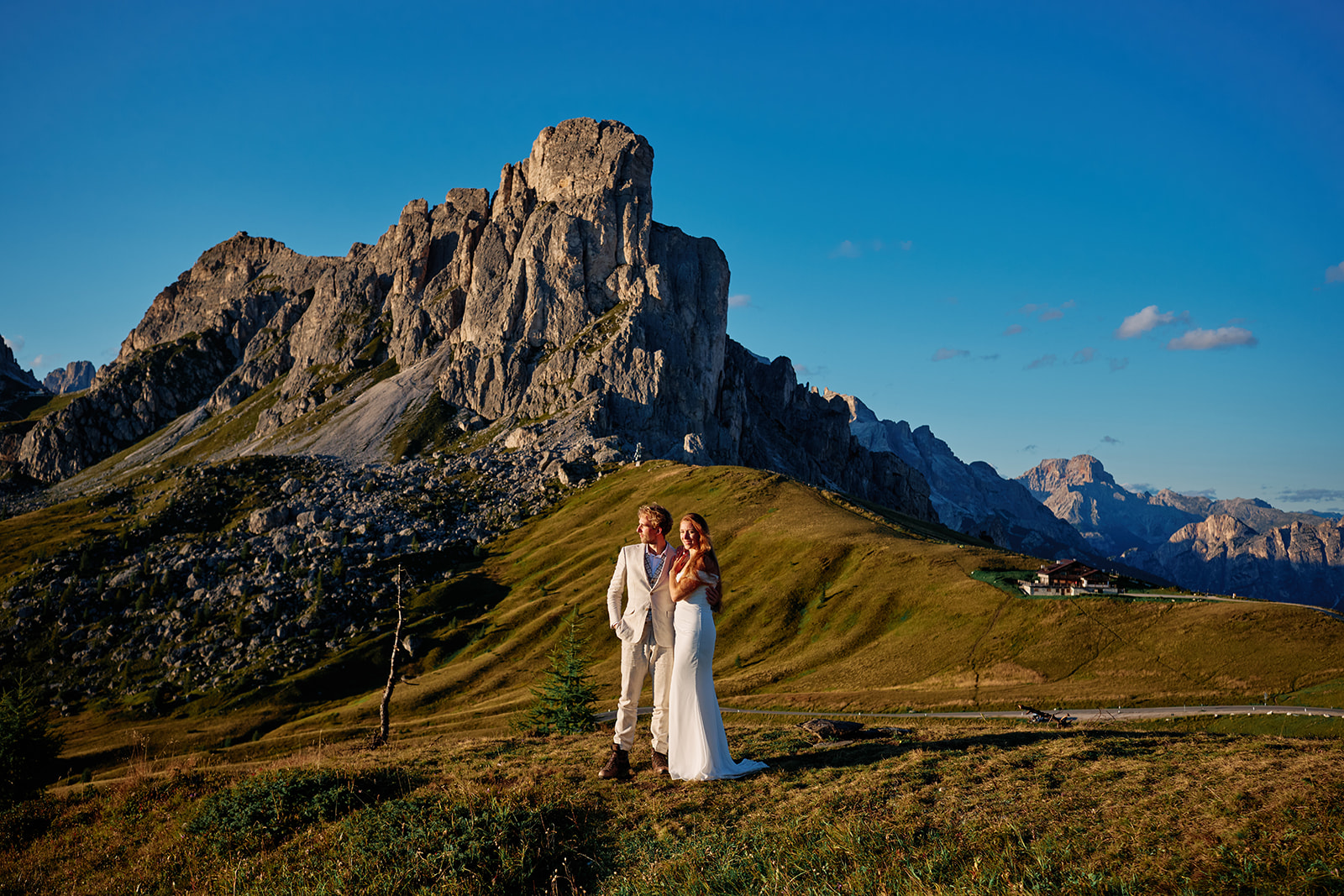 Couple at Passo Giau as the sun goes down, Dolomites