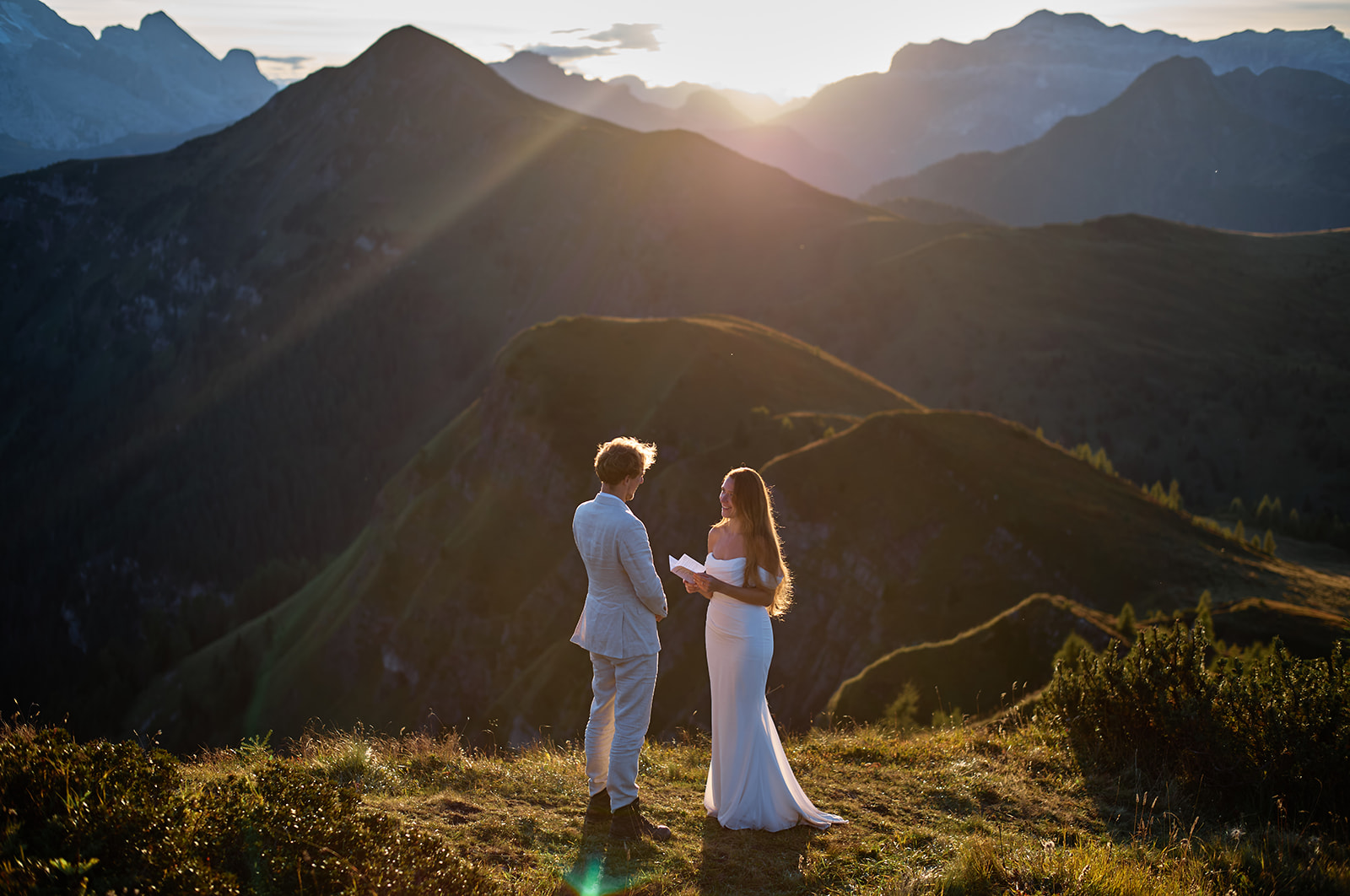 Couple at Passo Giau as the sun goes down, Dolomites