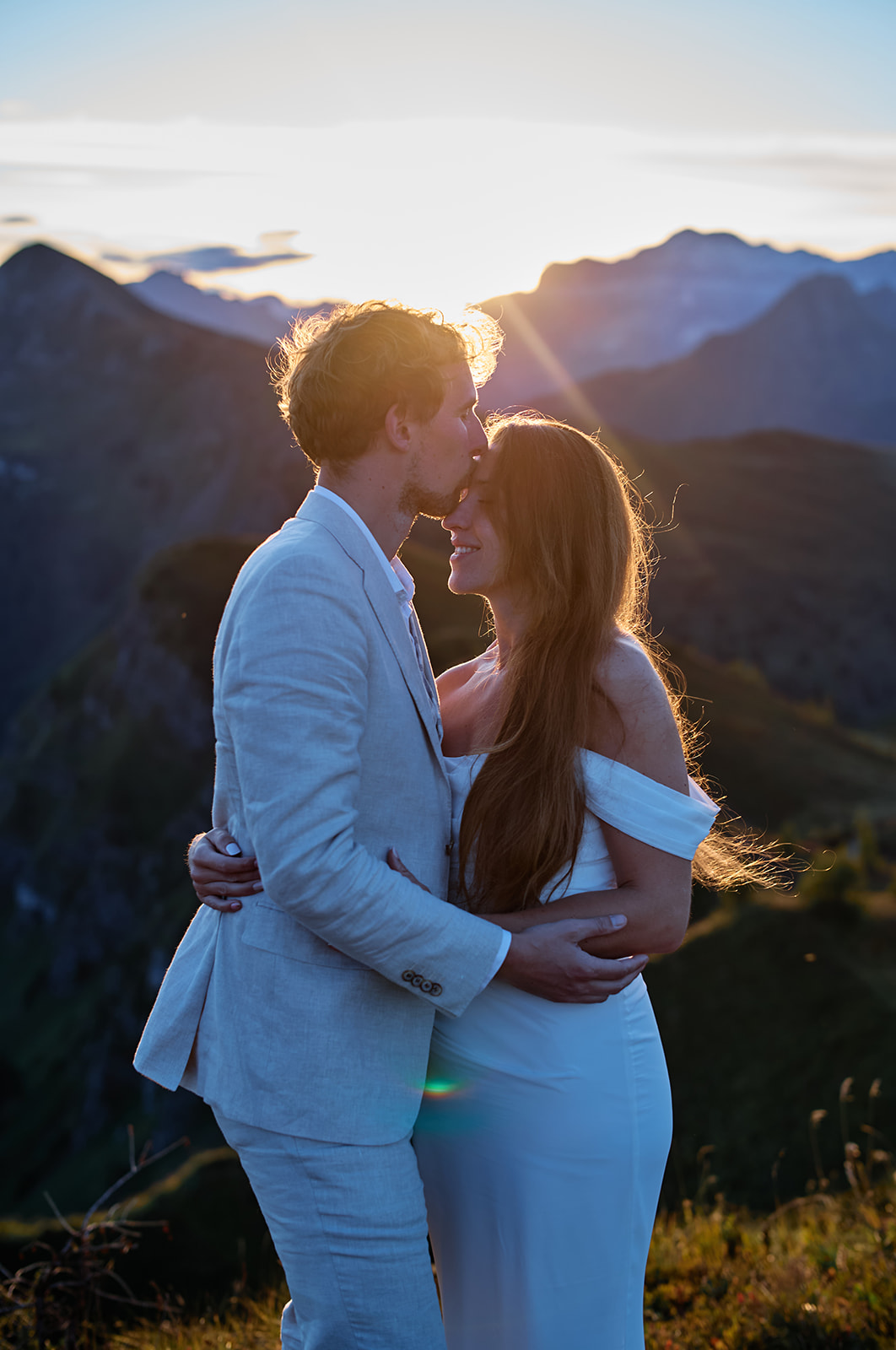 Couple at Passo Giau as the sun goes down, Dolomites