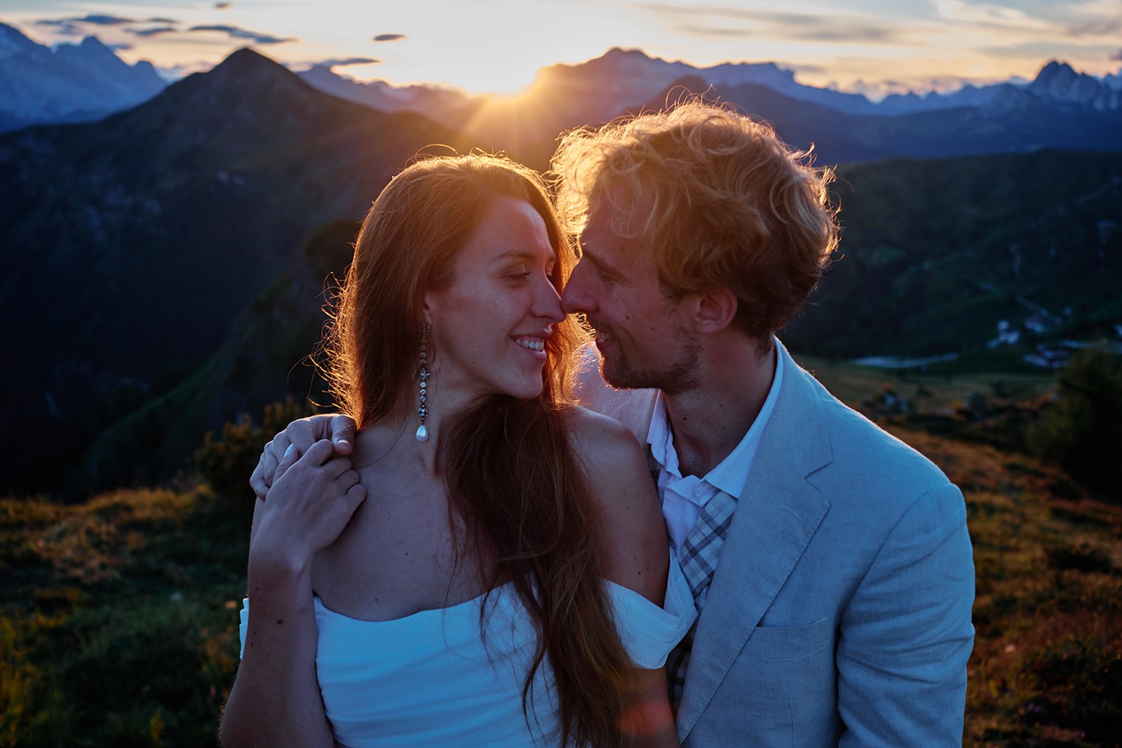 Couple at Passo Giau as the sun goes down, Dolomites