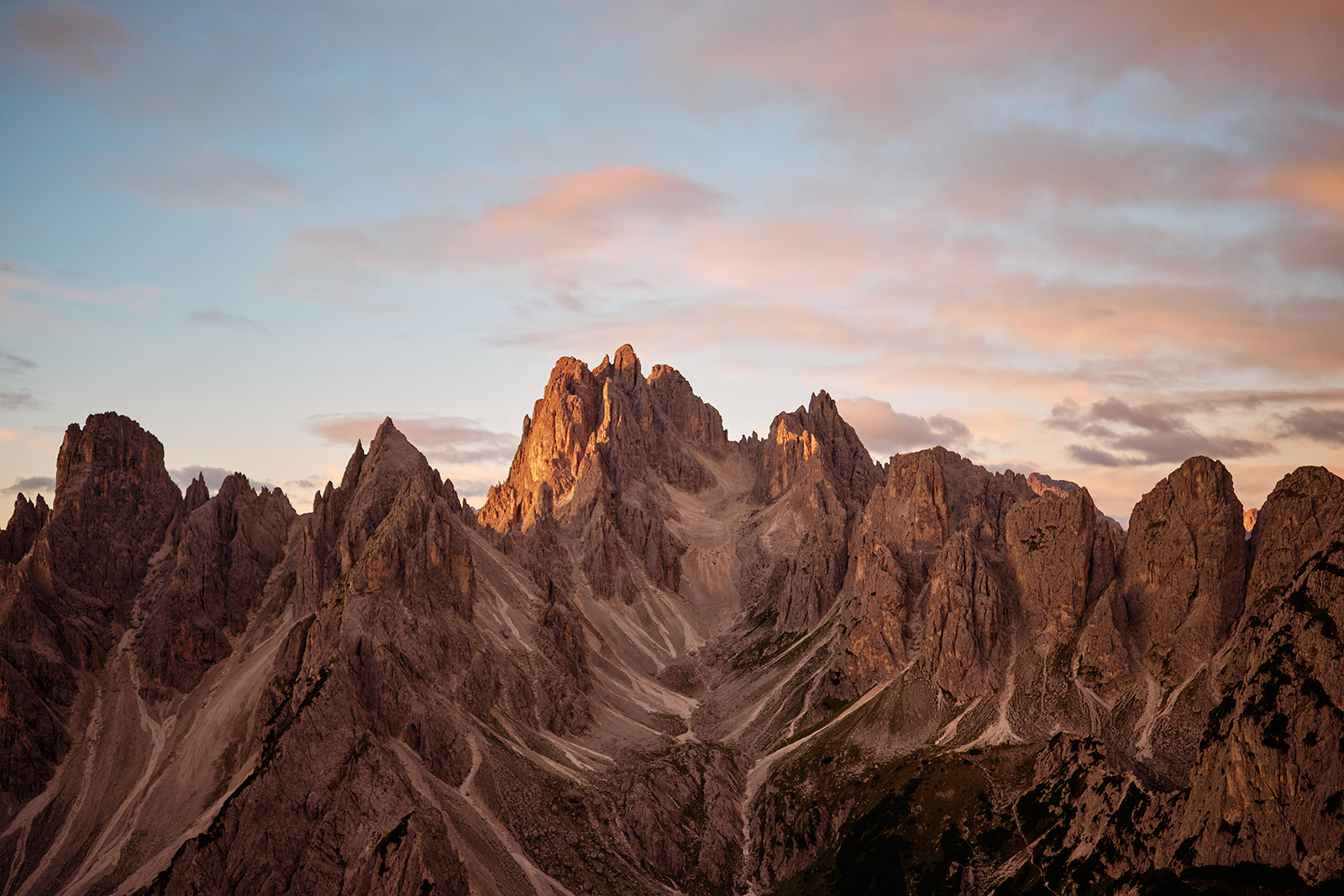 Couple at the north faces of Tre Cime, Dolomites