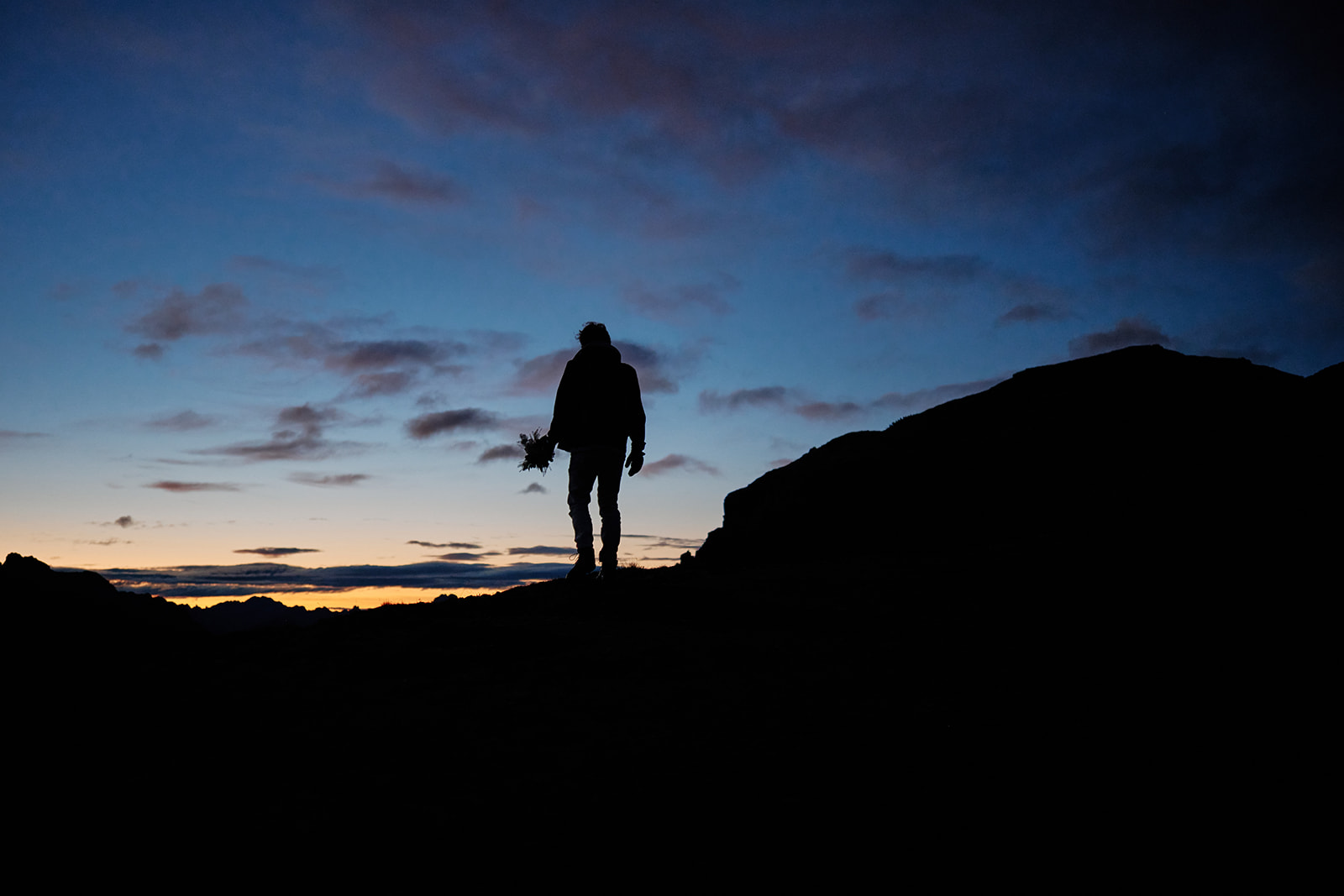 Couple at the north faces of Tre Cime, Dolomites