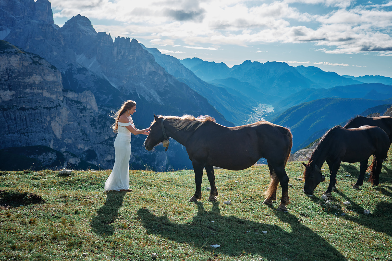 Bride with wild horses below Tre Cime, Dolomites