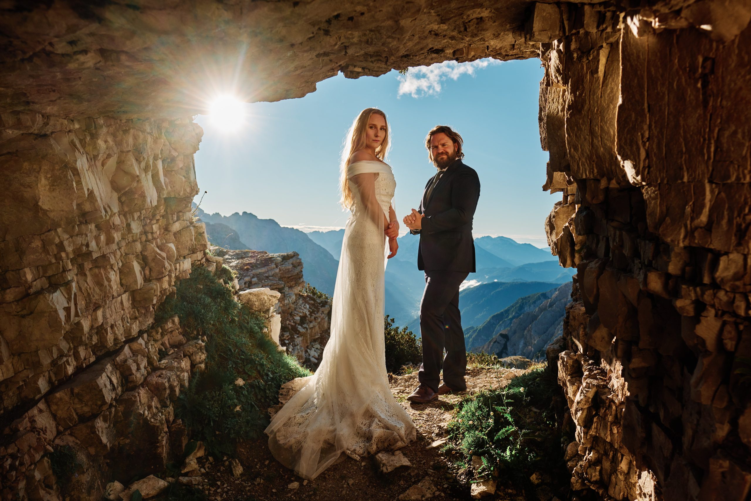 Peter & Moa seen through a rock arch near Tre Cime