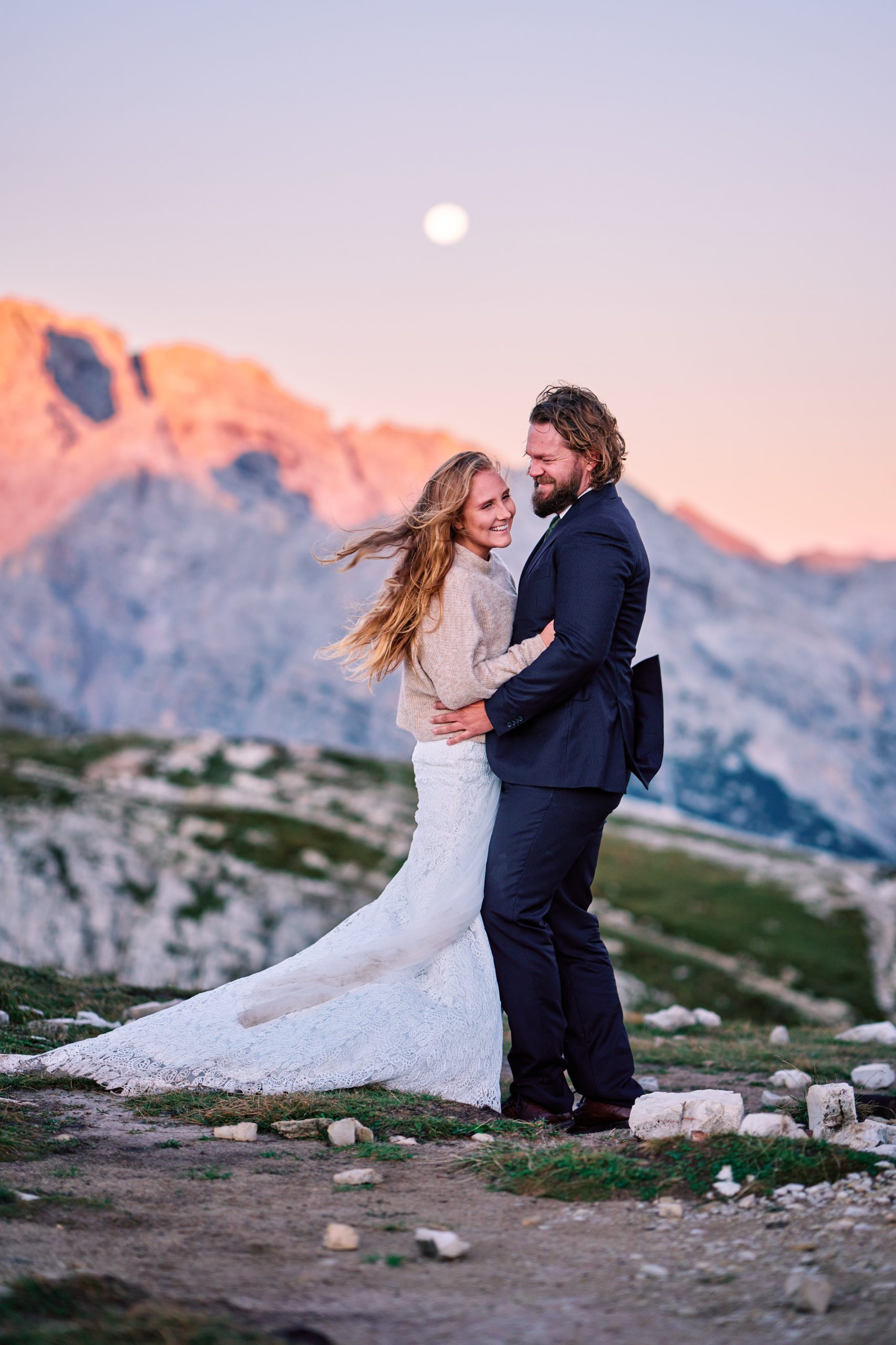 Peter & Moa at sunrise — alpenglow on the peaks, Dolomites