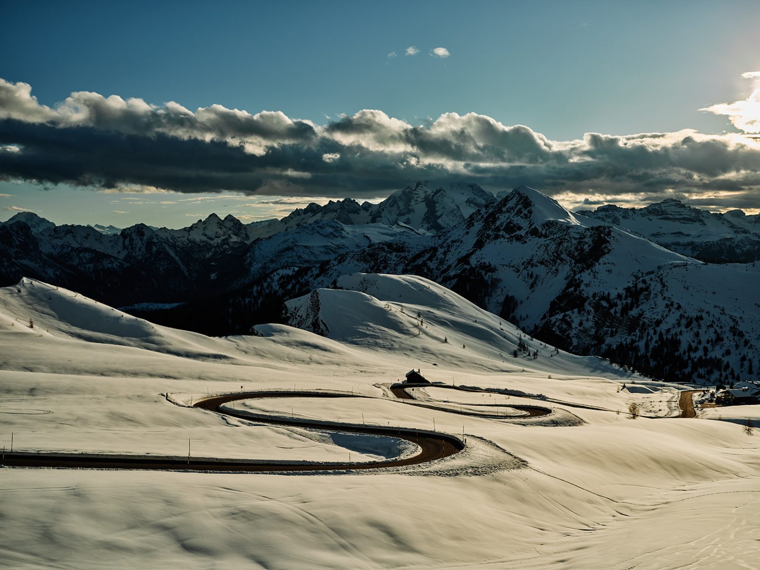 Dawn light over the snowy Dolomites, winter in Italy