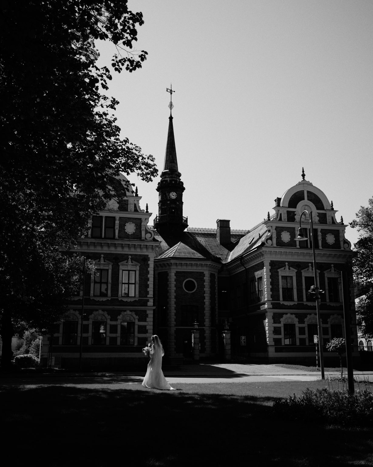 The old landmark building with the green spire in central Söderhamn