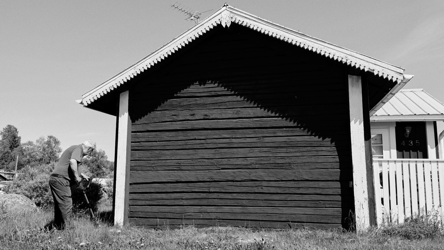 A red Swedish boathouse on the Baltic coast near Skärså